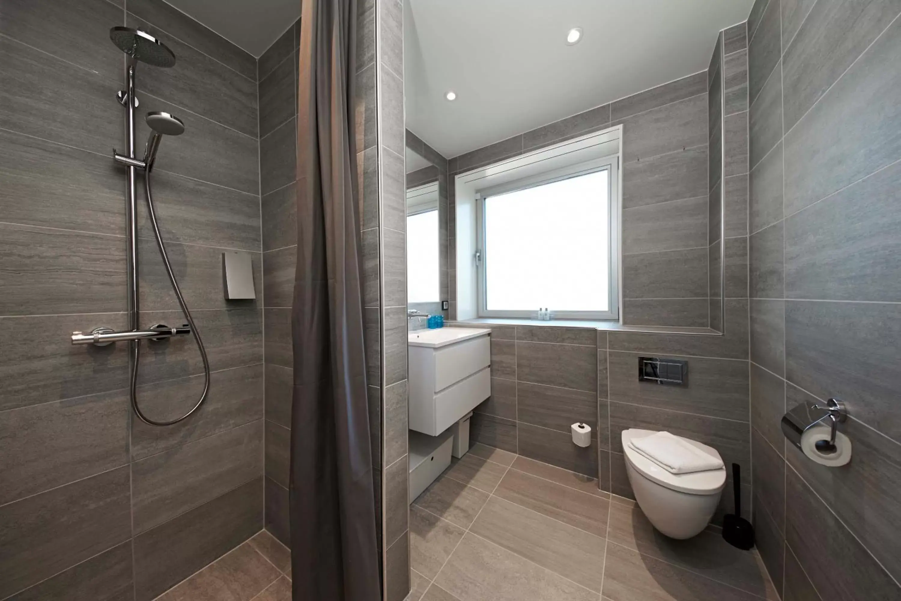 Shower, Bathroom in Living Suites