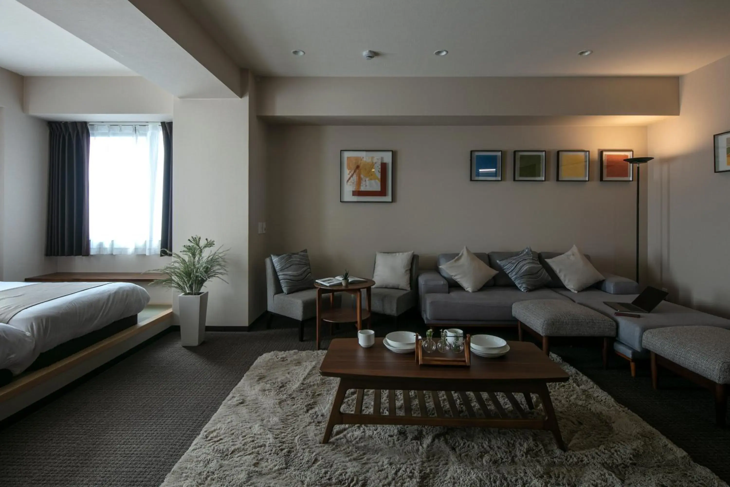 Living room, Bed in Randor Residential Hotel Kyoto Suites