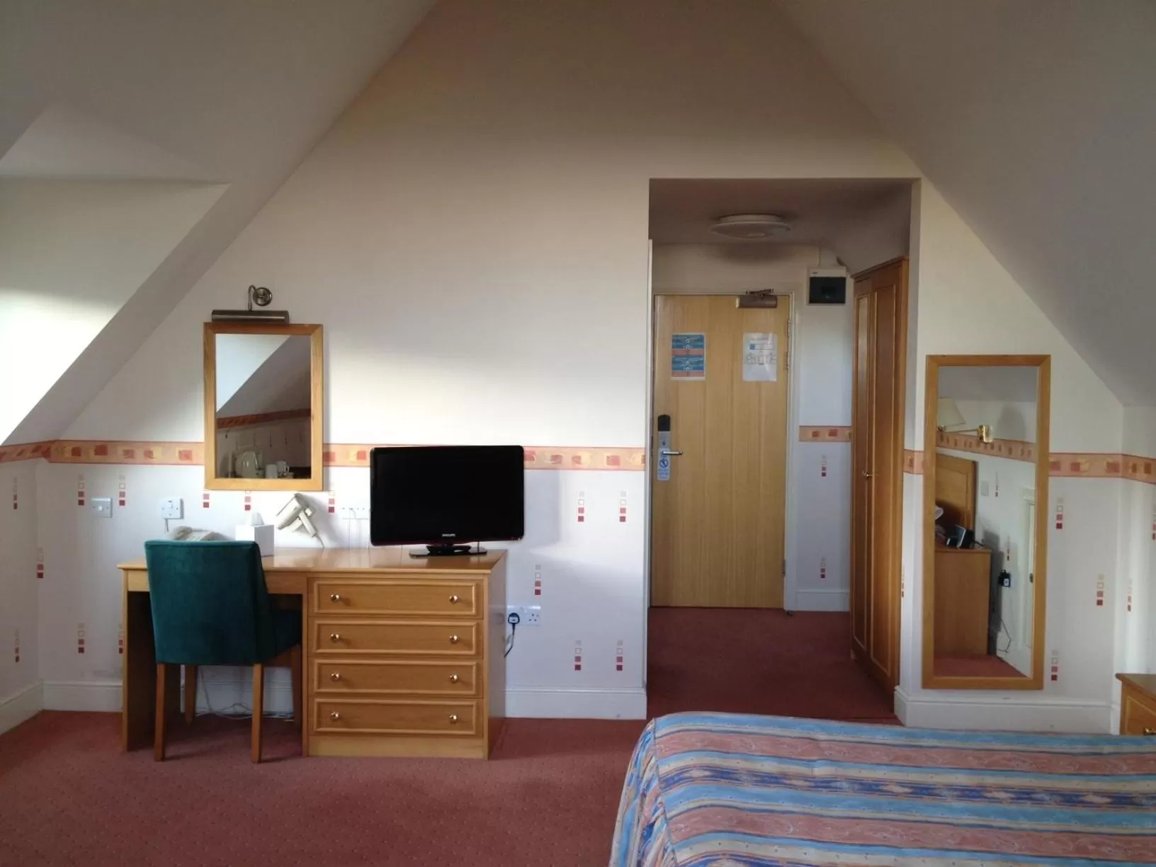 Decorative detail, TV/Entertainment Center in Louisa Lodge & Purbeck House Hotel