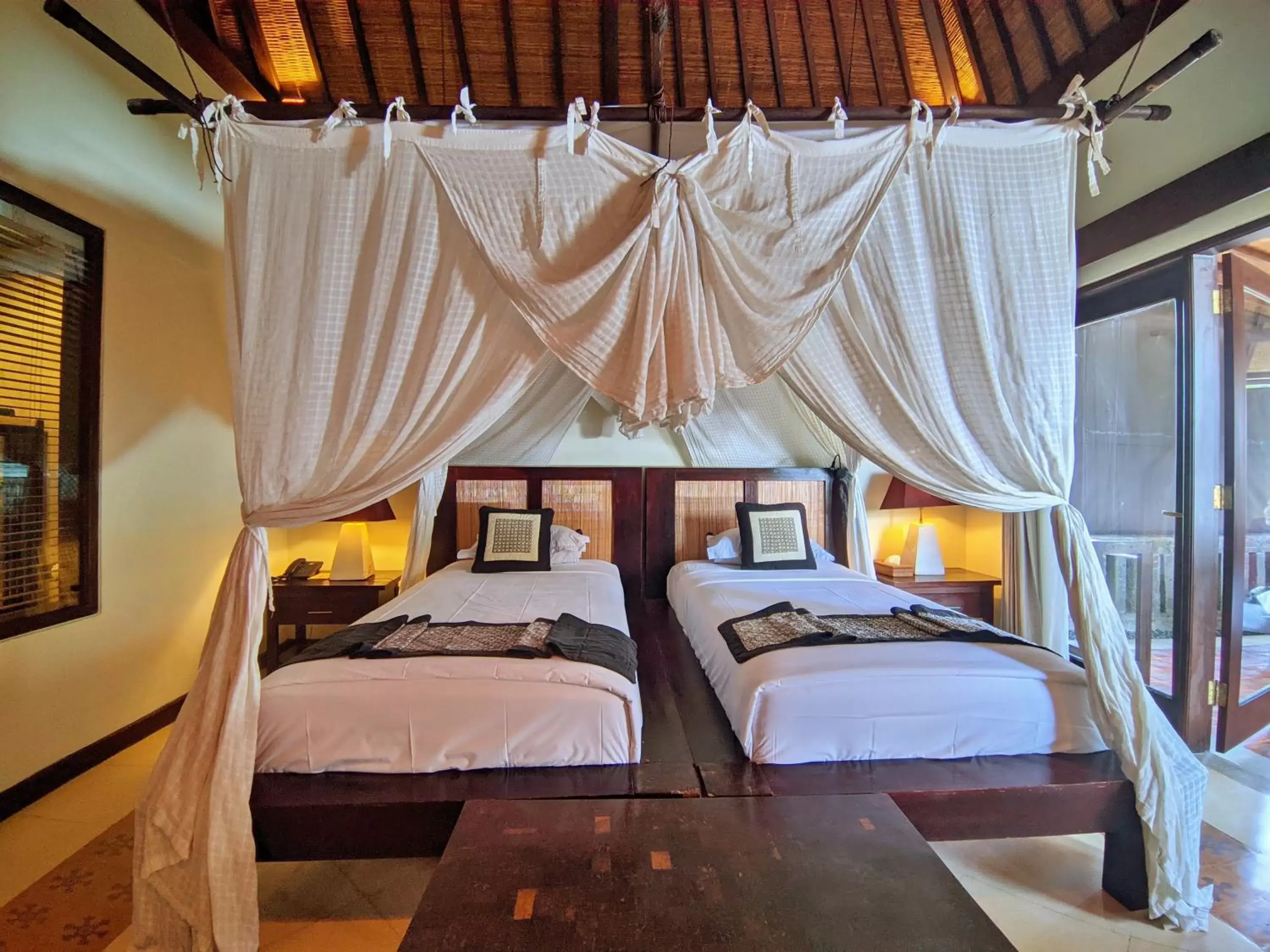 Bed in Barong Resort and Spa