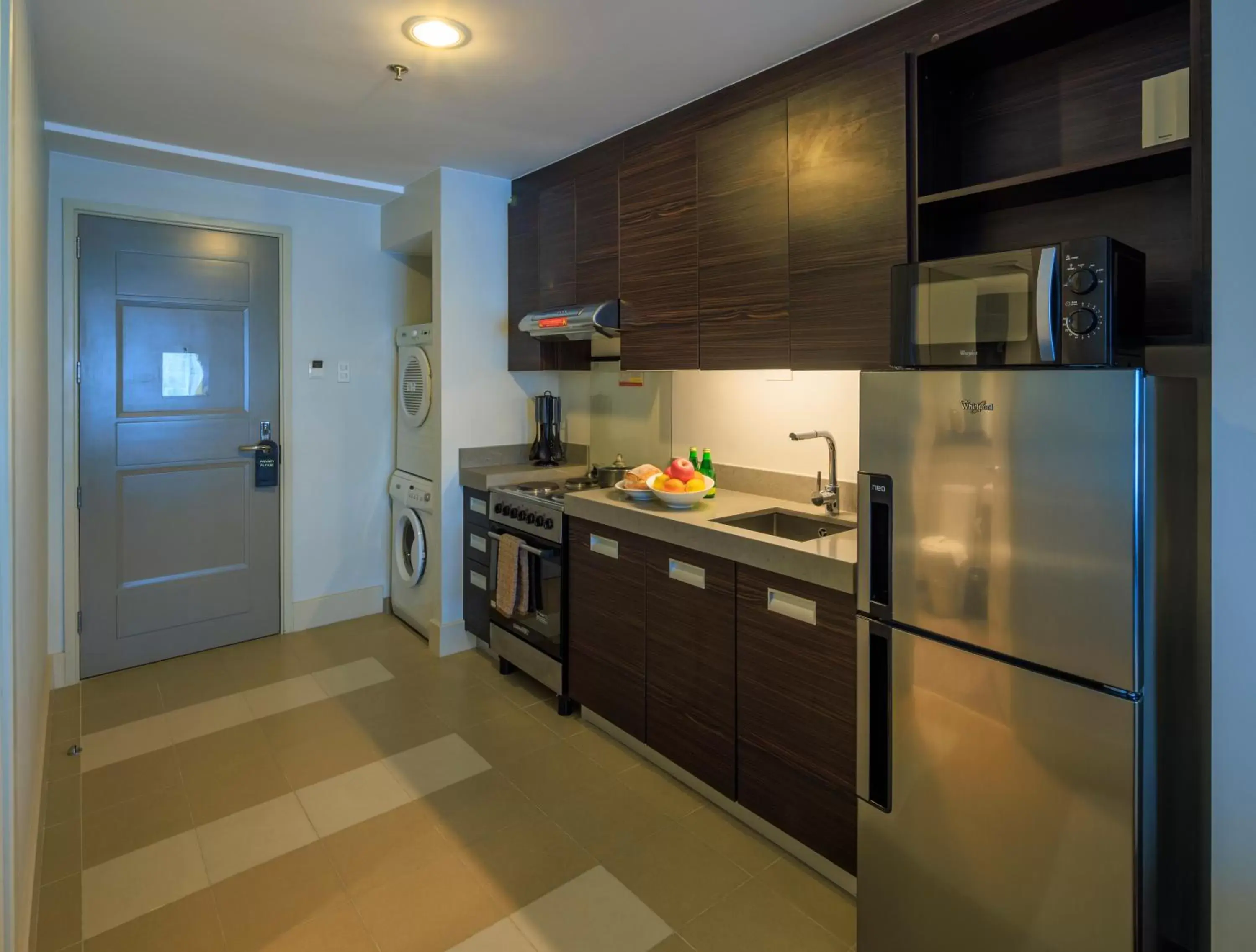 kitchen, Kitchen/Kitchenette in Aruga Apartments by Rockwell Makati
