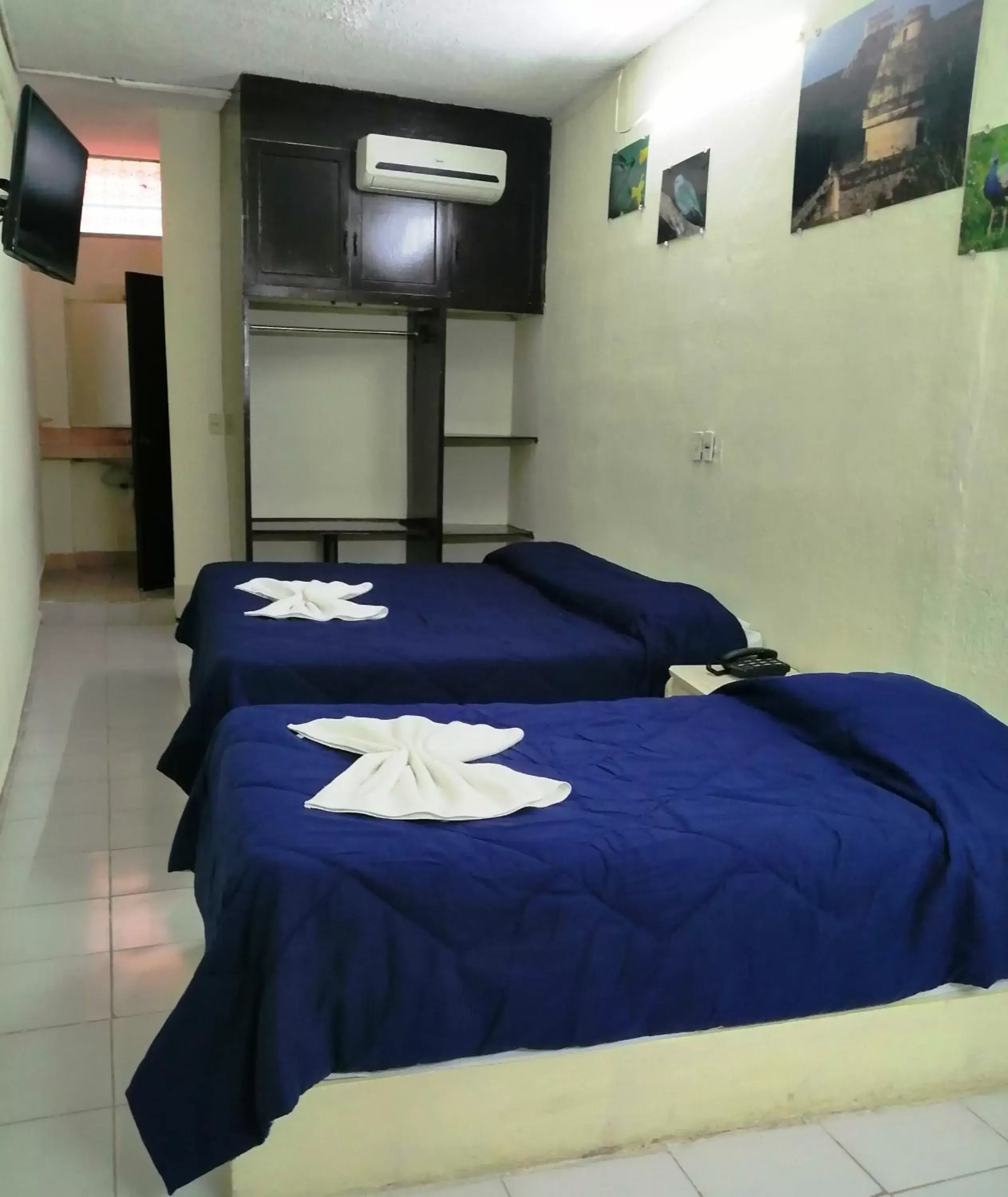 Bed in Hotel Suites Elia Noemi