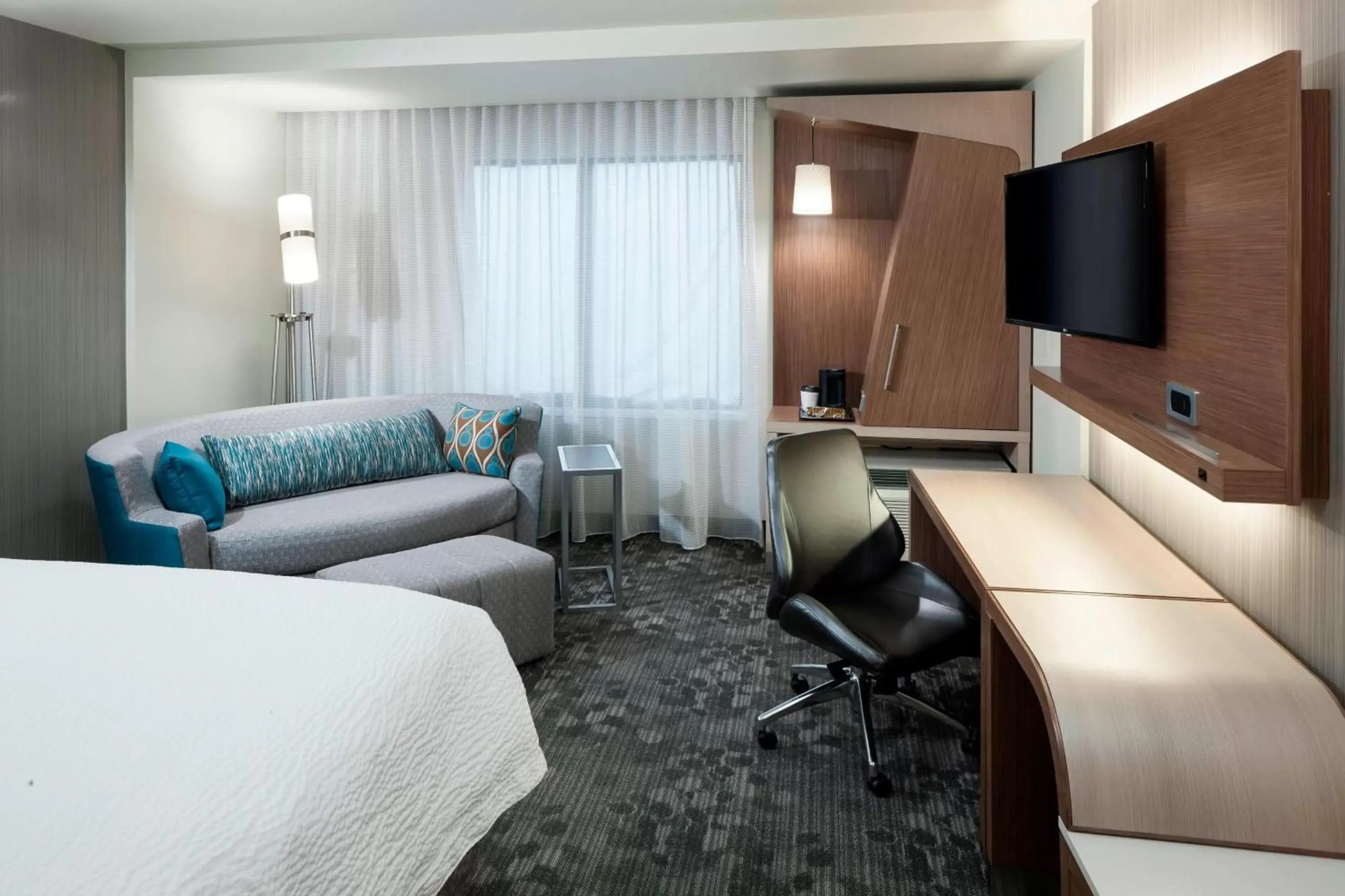 Photo of the whole room, Seating Area in Courtyard by Marriott Fort Worth Alliance Town Center