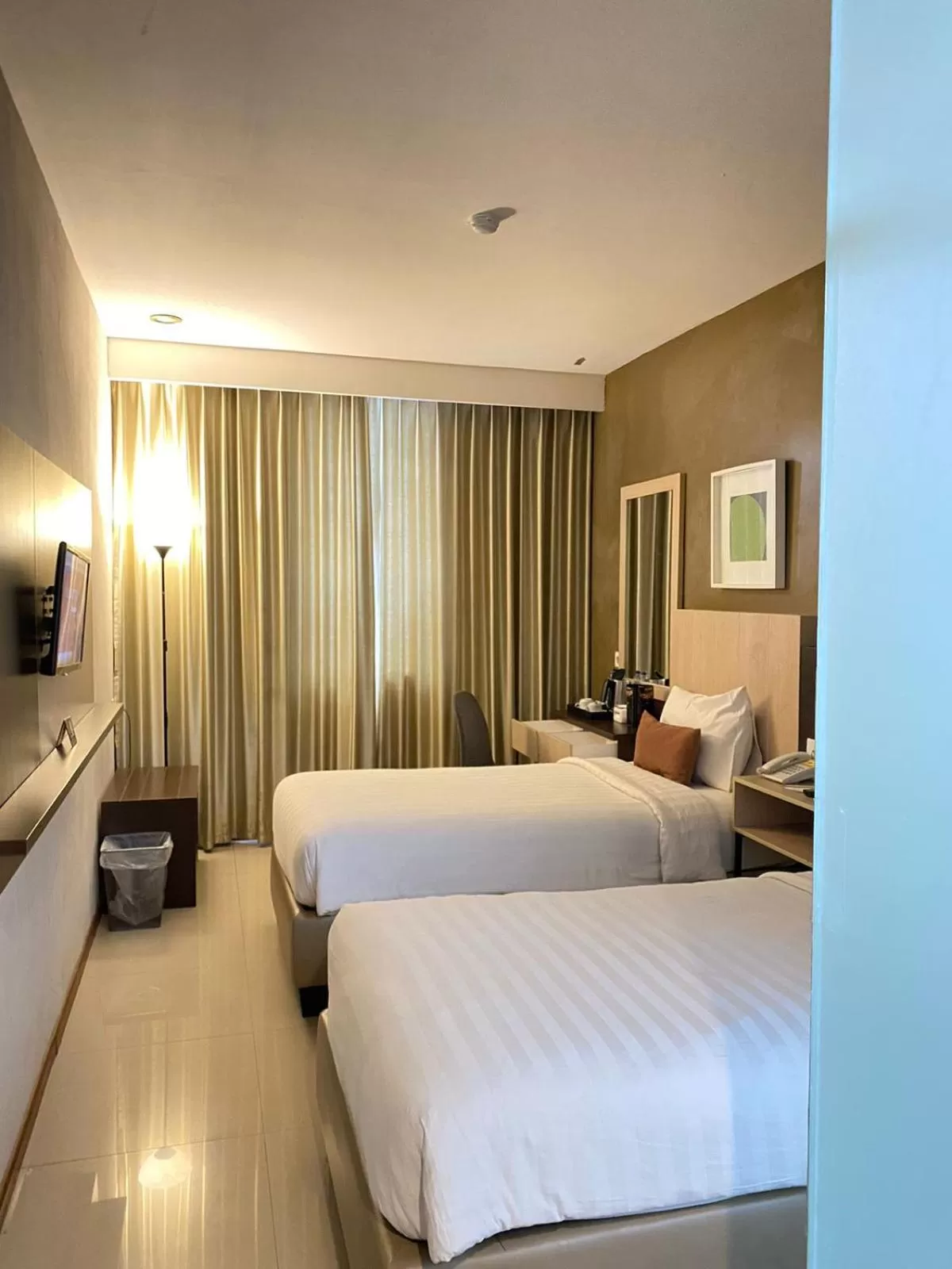 Bed in De Laxston Hotel Yogyakarta, Azana Hotels Collection
