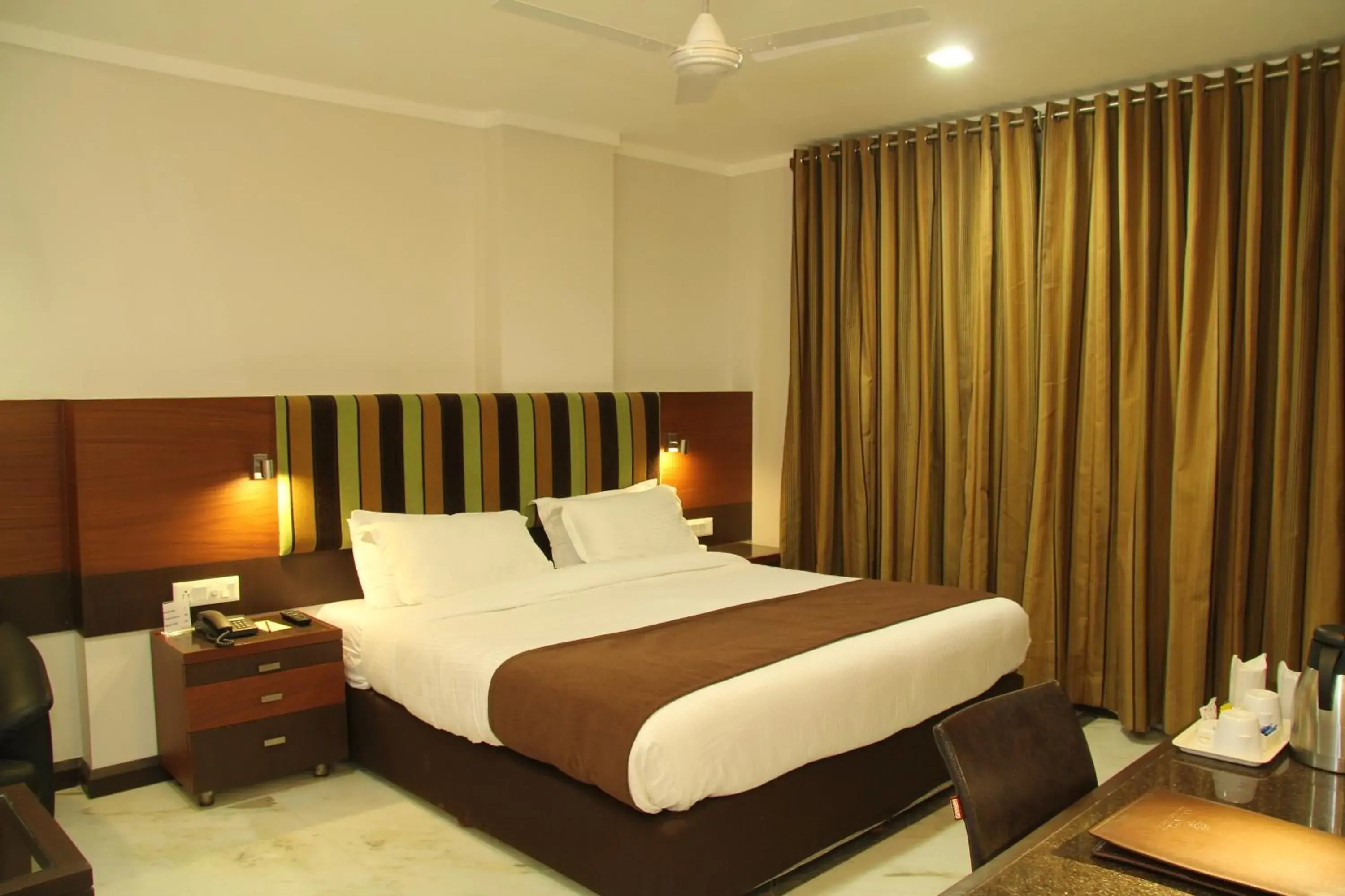 Bed, Room Photo in Amantra Comfort Hotel
