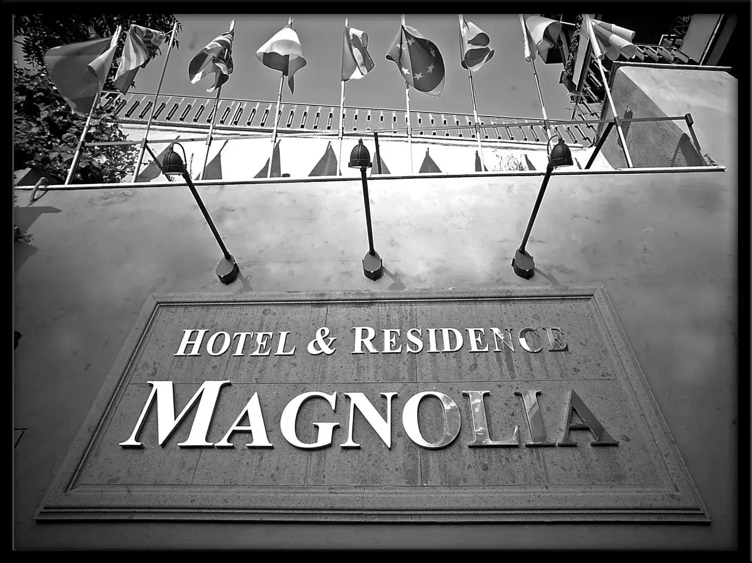 Property logo or sign in Hotel Residence Magnolia