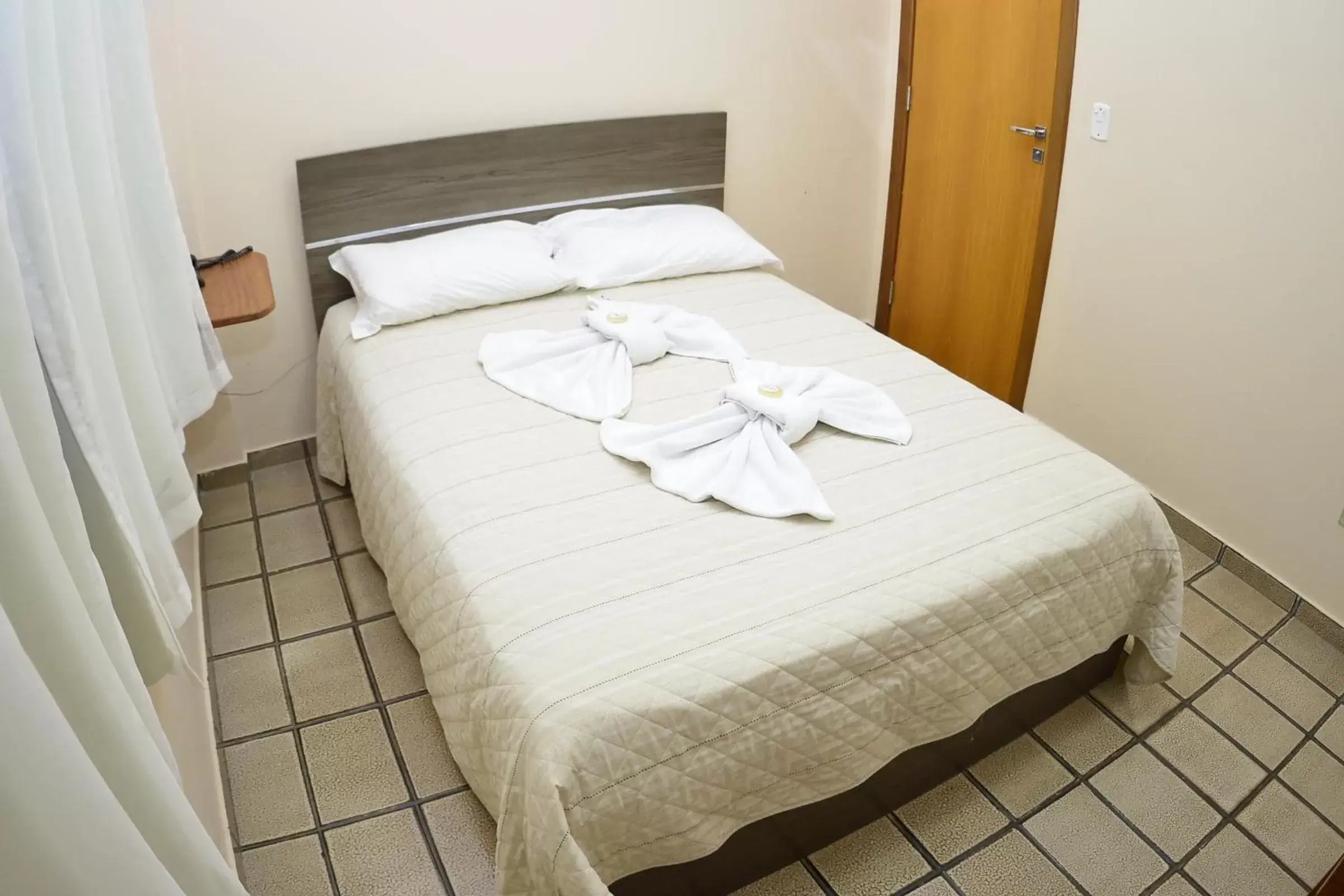 Bed in Hotel Raio de Sol Bed in Hotel Raio de Sol