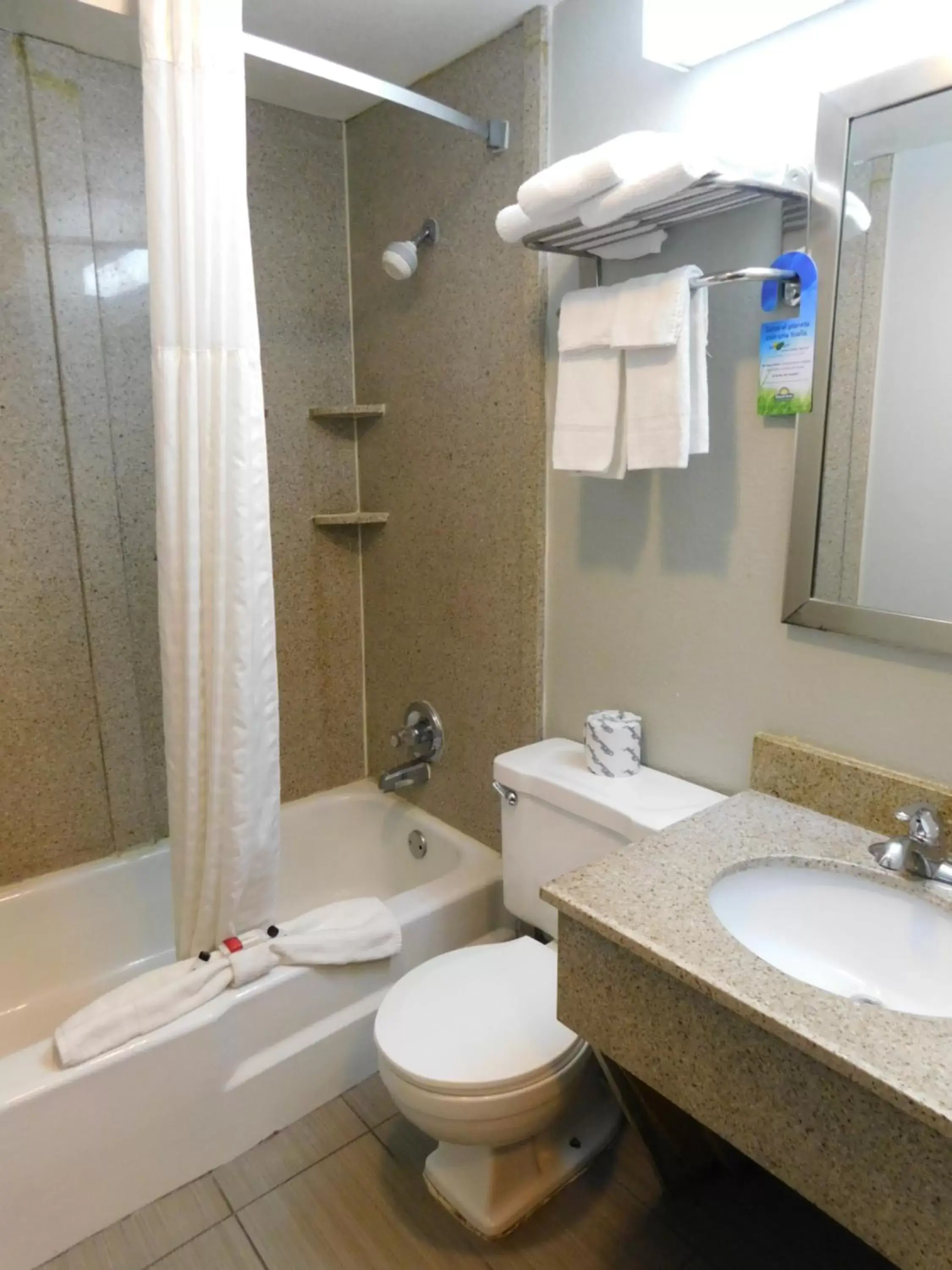 Bathroom in Days Inn & Suites by Wyndham Downtown Gatlinburg Parkway