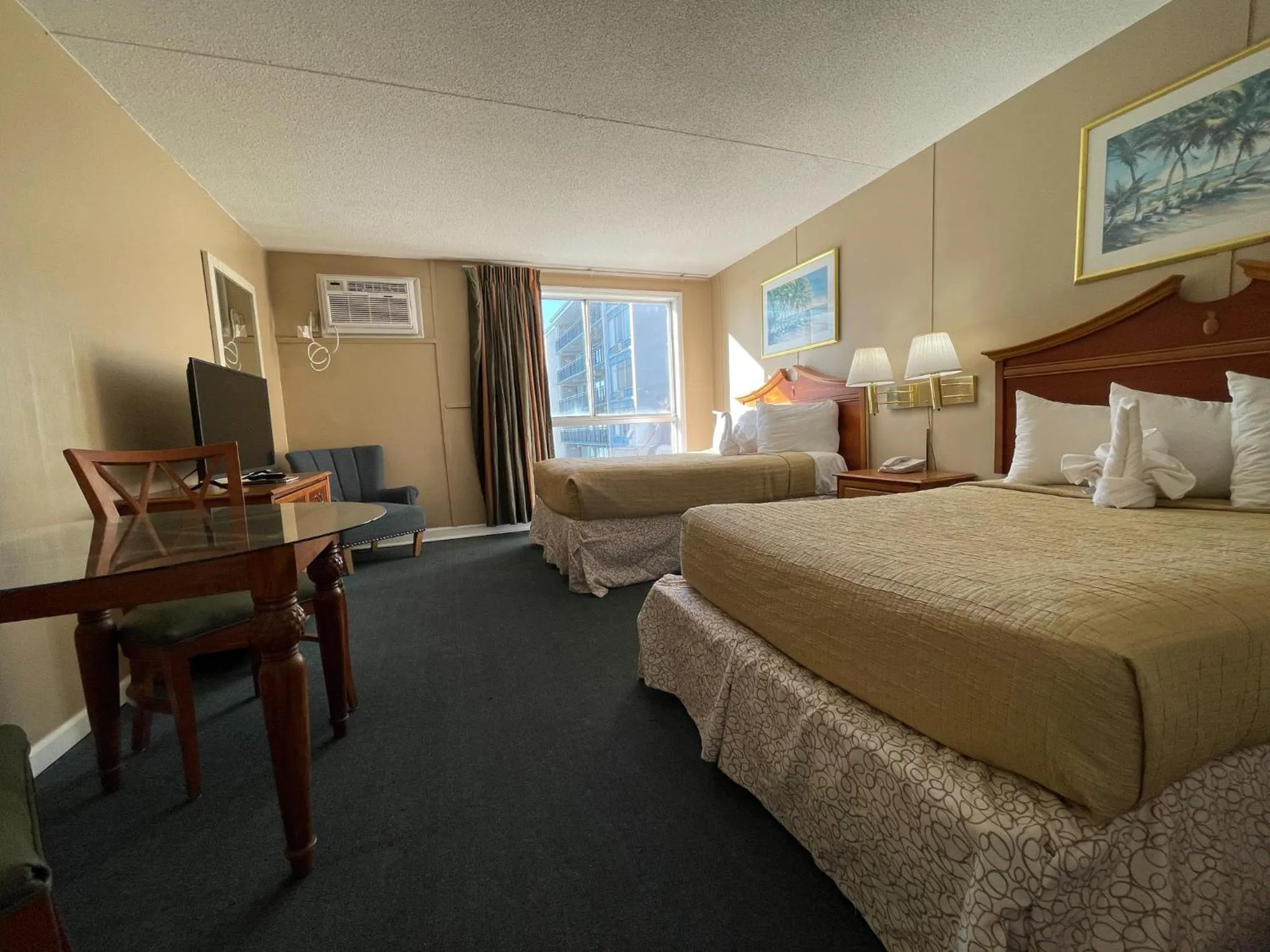 Bed in Polynesian Oceanfront Hotel