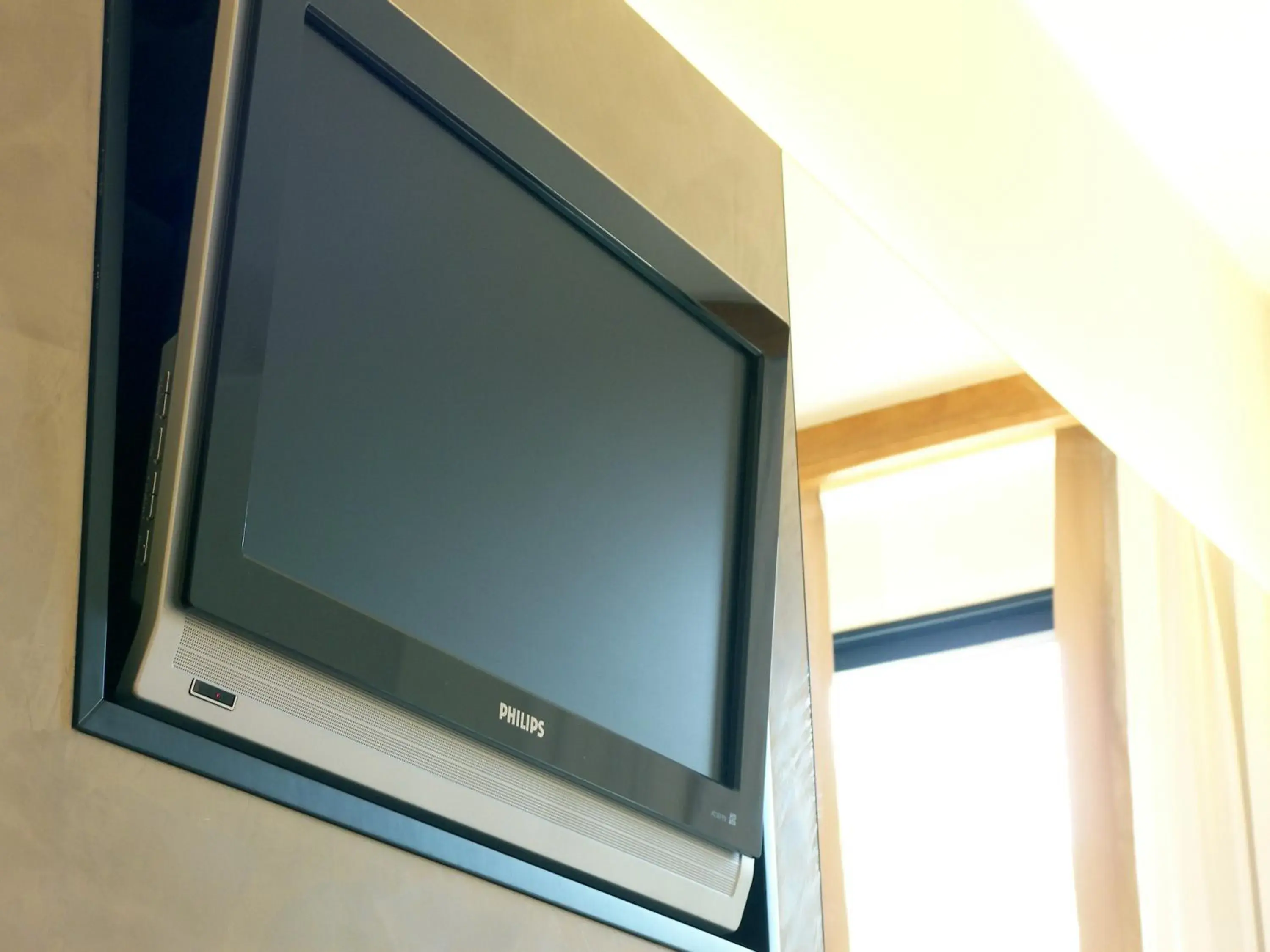 TV and multimedia, TV/Entertainment Center in Hotel President