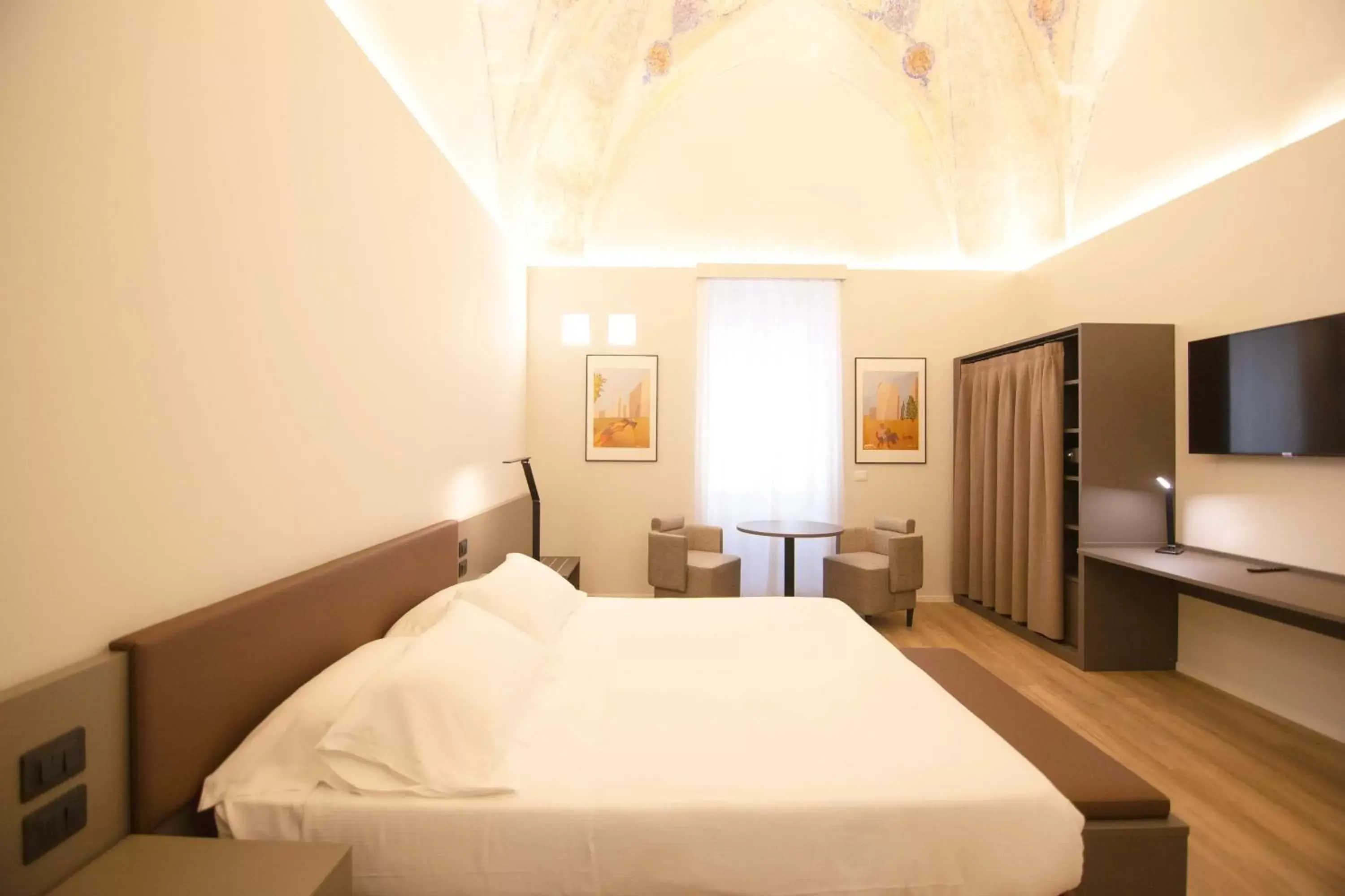 Bed in Palazzo Bellocchi - Suites & Apartments