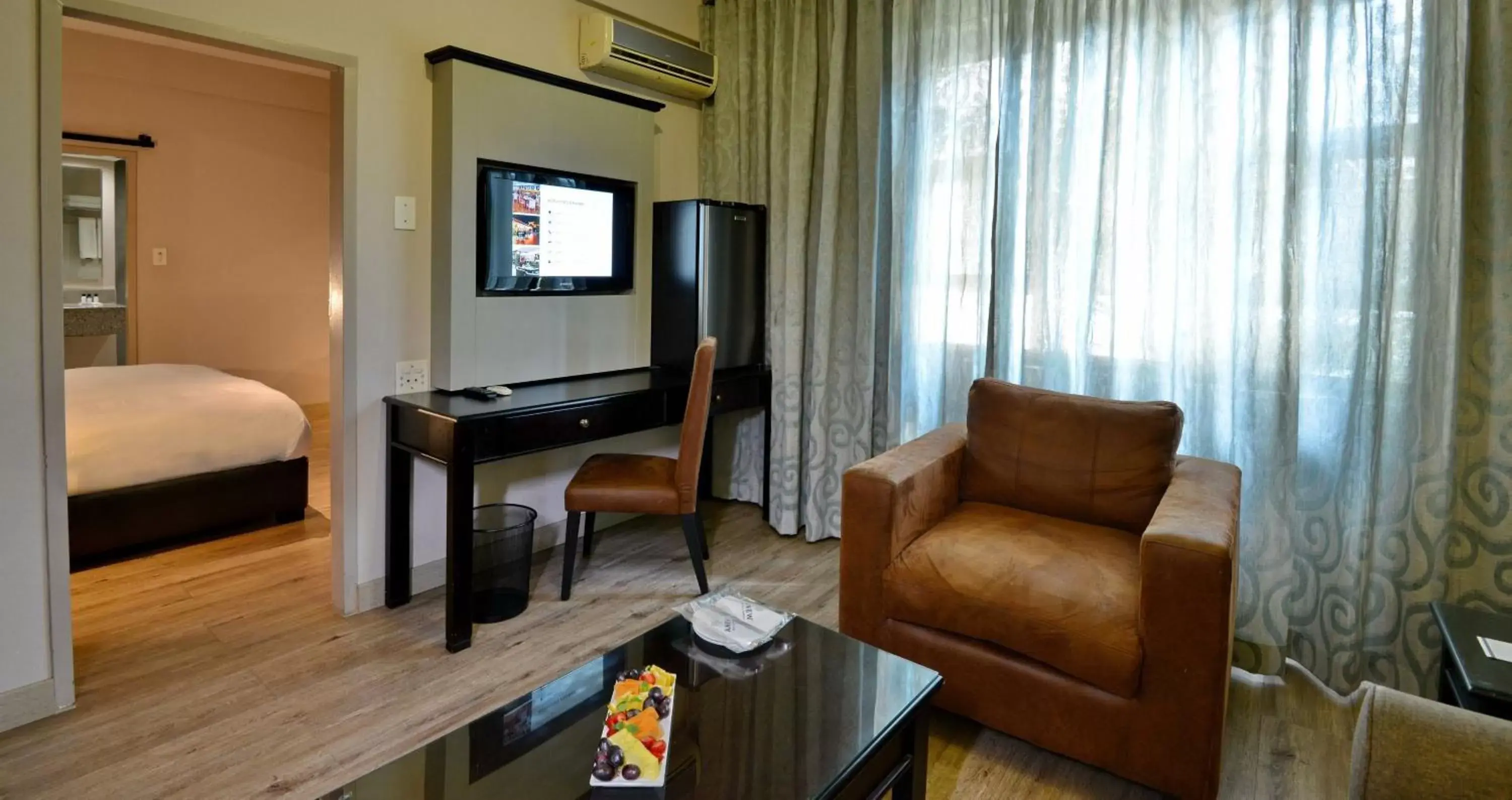 TV and multimedia, Seating Area in ANEW Hotel Capital Pretoria