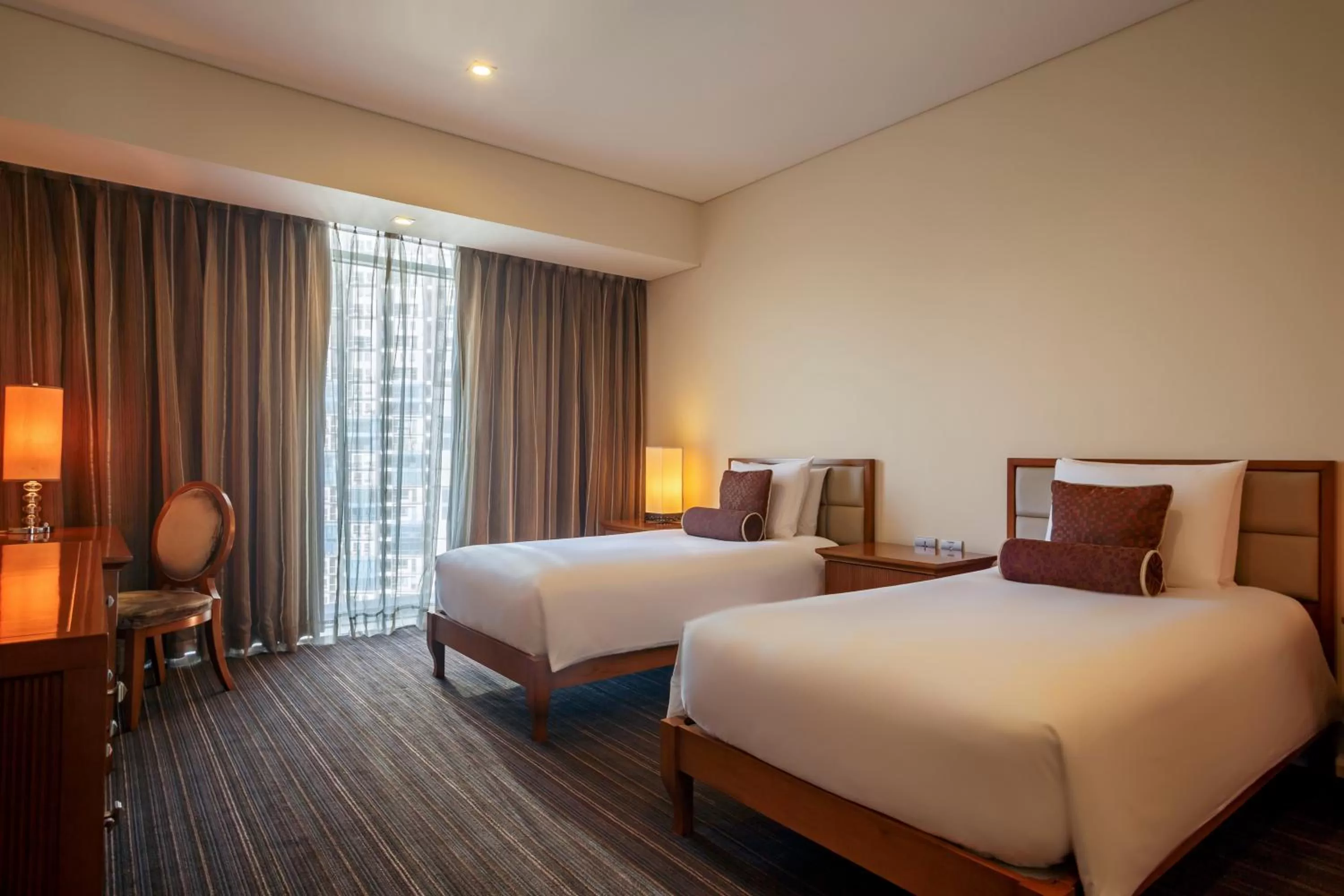 Bed in Joy Nostalg Hotel and Suites Manila Managed by The Ascott Limited