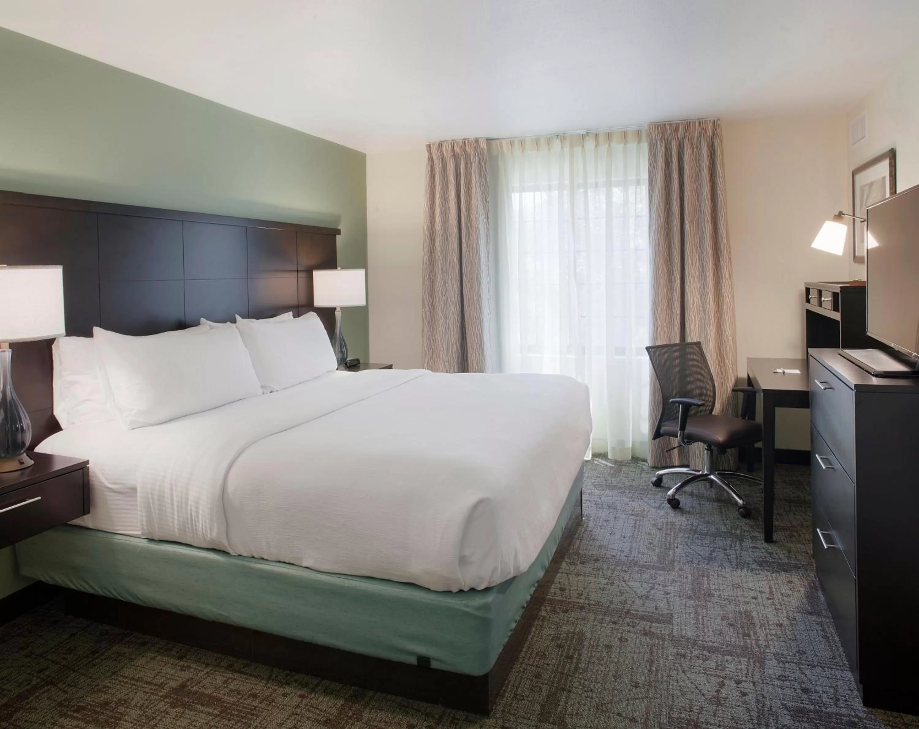 Photo of the whole room, Bed in Staybridge Suites Fayetteville by IHG
