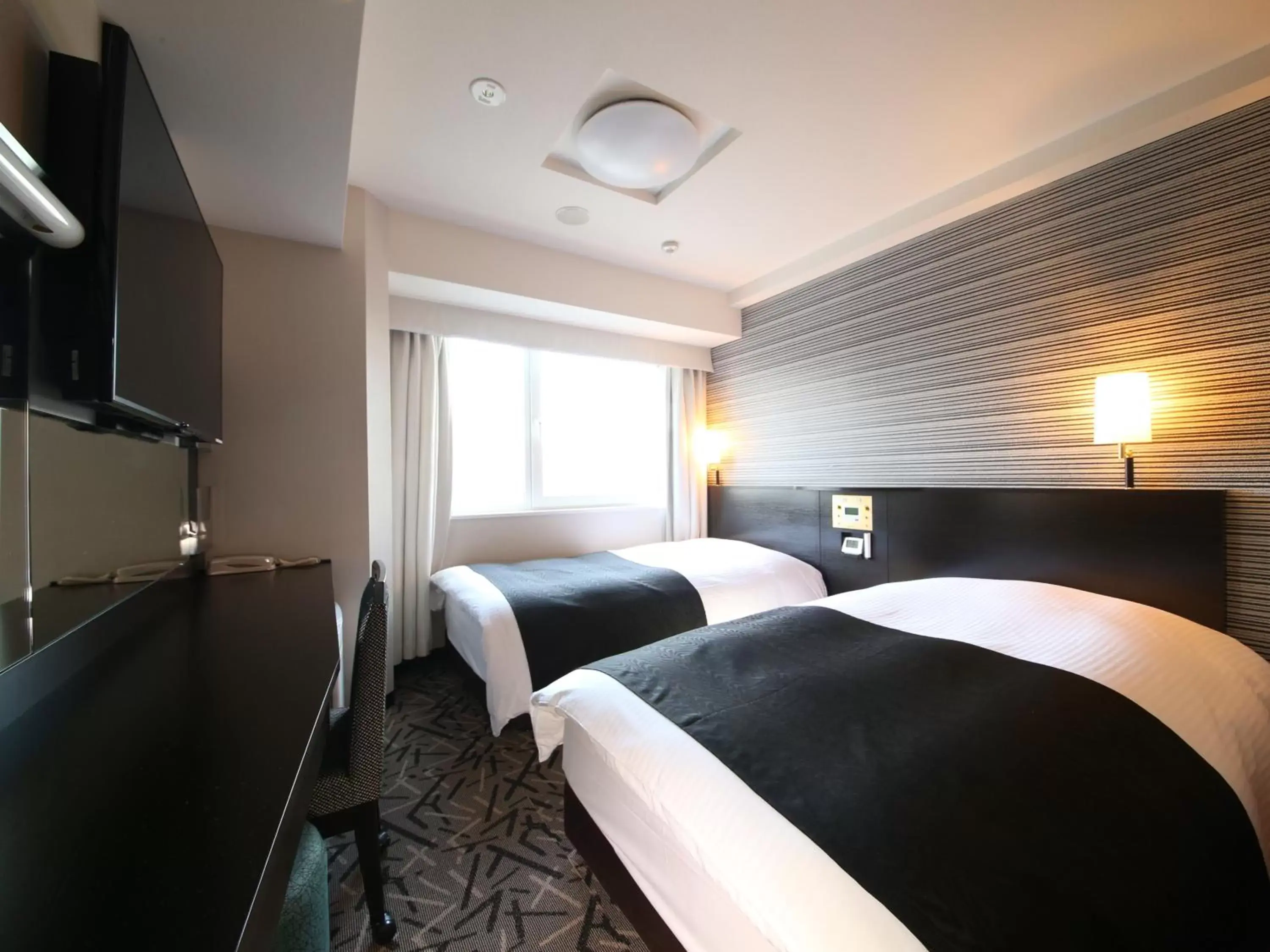 Photo of the whole room, Bed in APA Hotel & Resort Tokyo Bay Makuhari