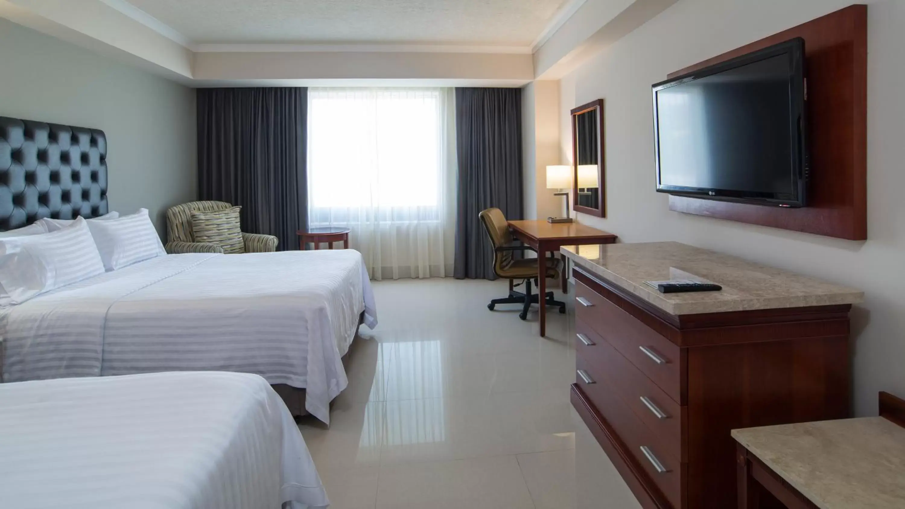 Photo of the whole room, TV/Entertainment Center in Holiday Inn Tuxtla Gutierrez, an IHG Hotel