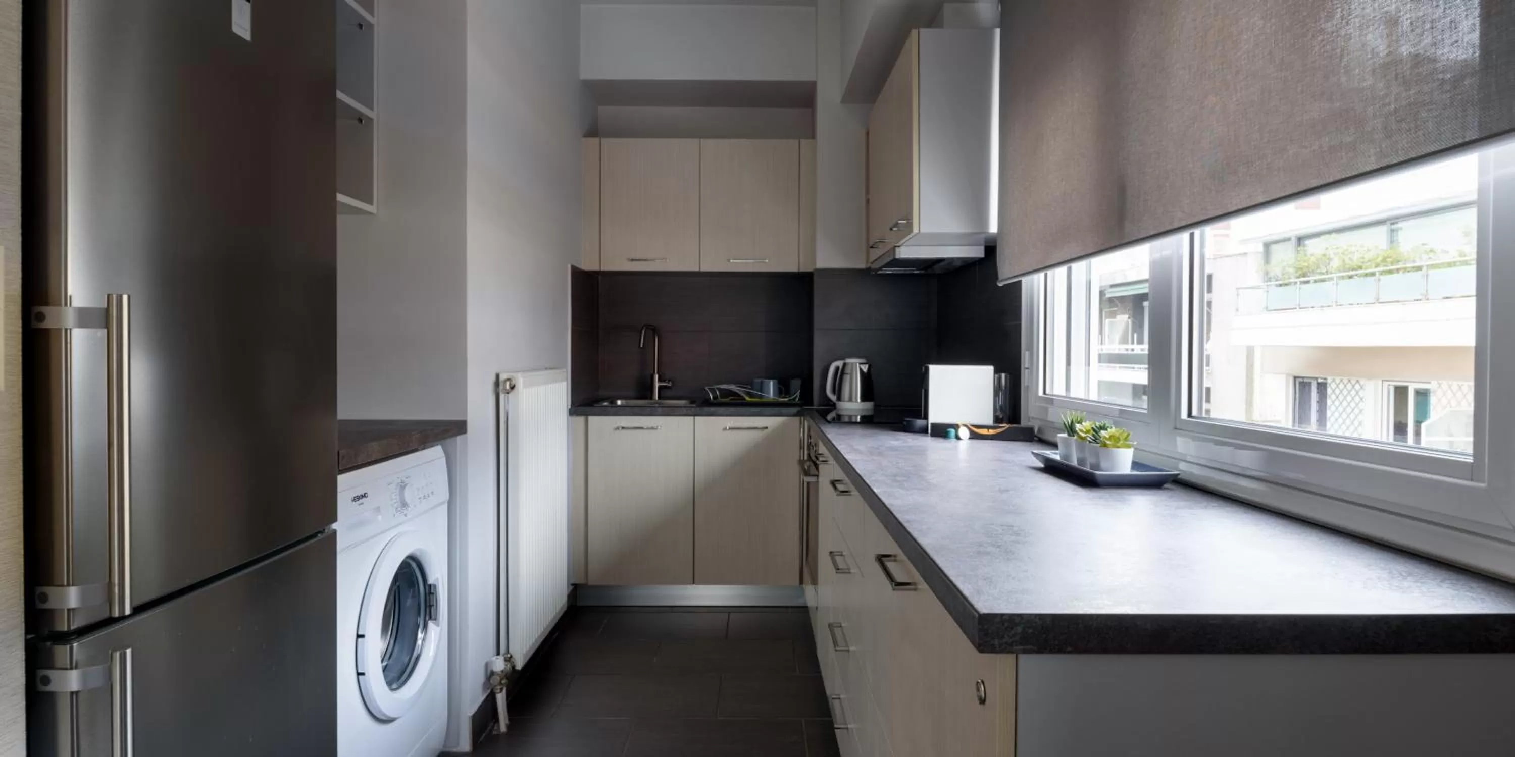 Kitchen or kitchenette in 12 Keys Athens Apartments