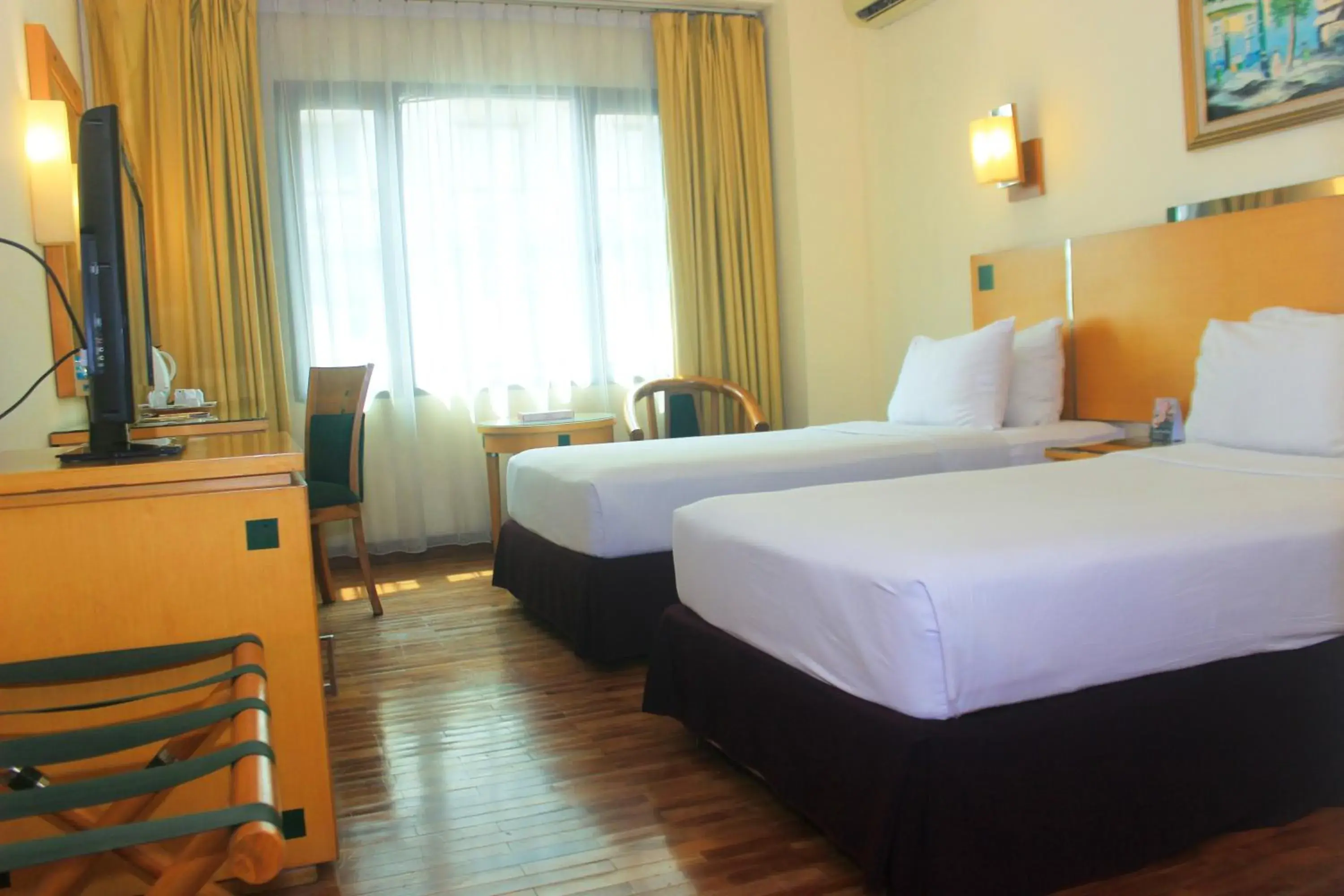 Photo of the whole room, Bed in Mega Anggrek Hotel Jakarta Slipi