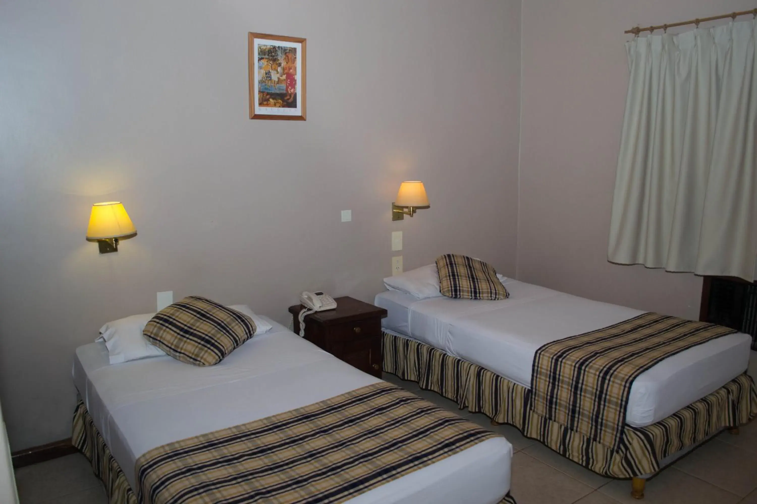 Bed in Marcopolo Suites Iguazu