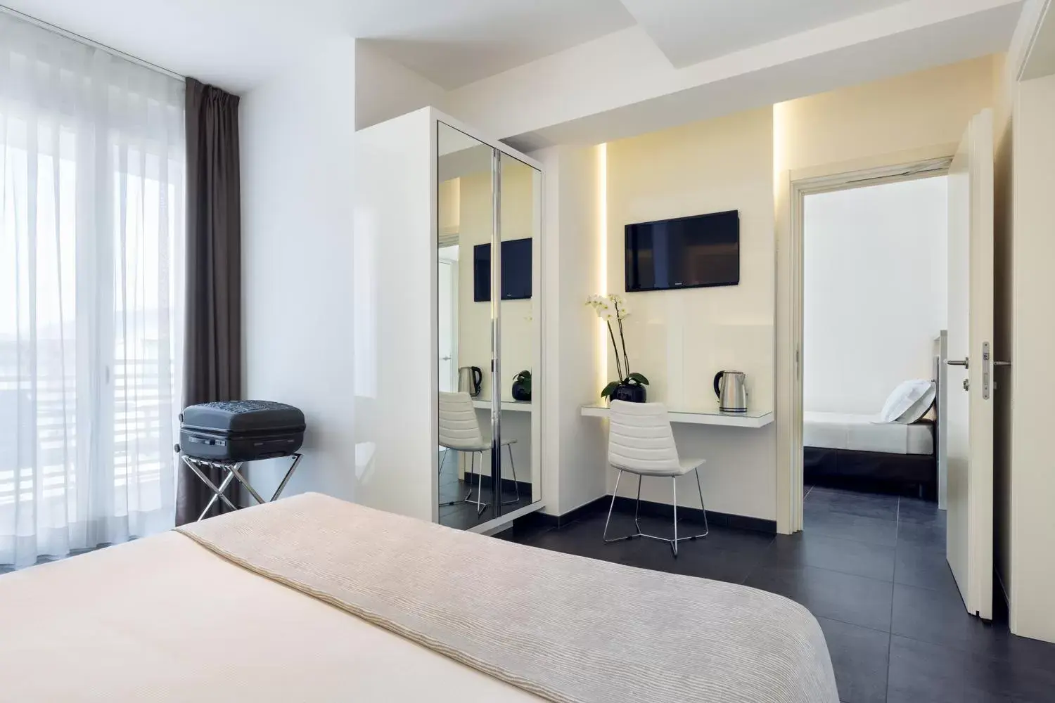 Bedroom, TV/Entertainment Center in Baldinini Hotel