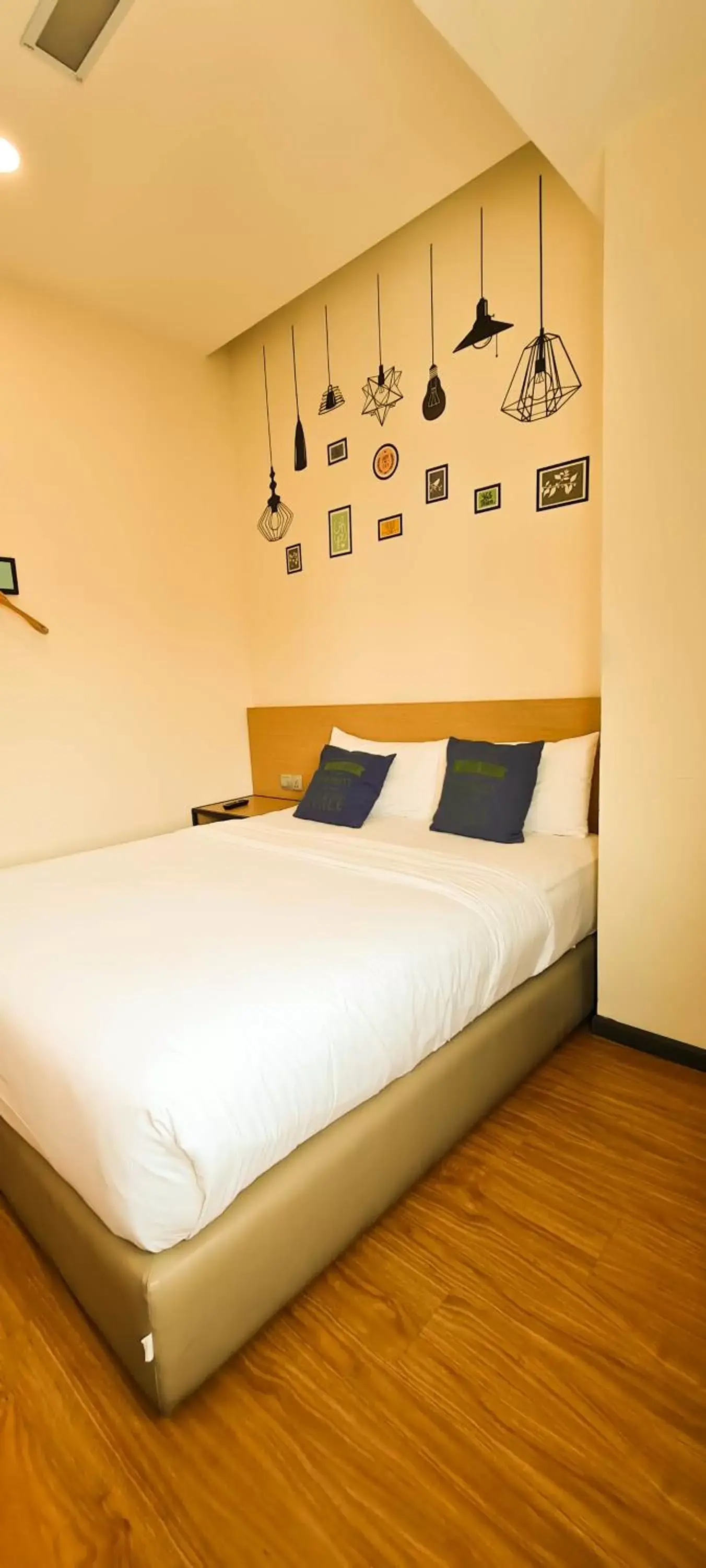 Bed in Qlio Hotel