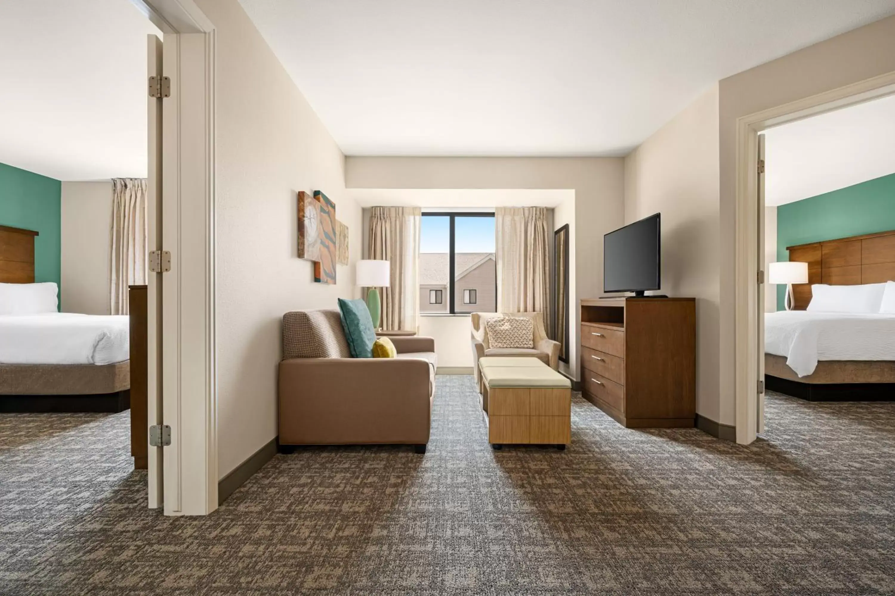 Photo of the whole room, Seating Area in Staybridge Suites Oklahoma City-Quail Springs, an IHG Hotel