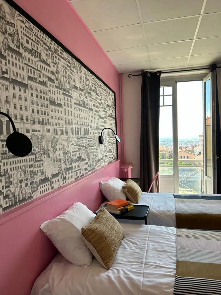 Bed in Hôtel de la Croix-Rousse