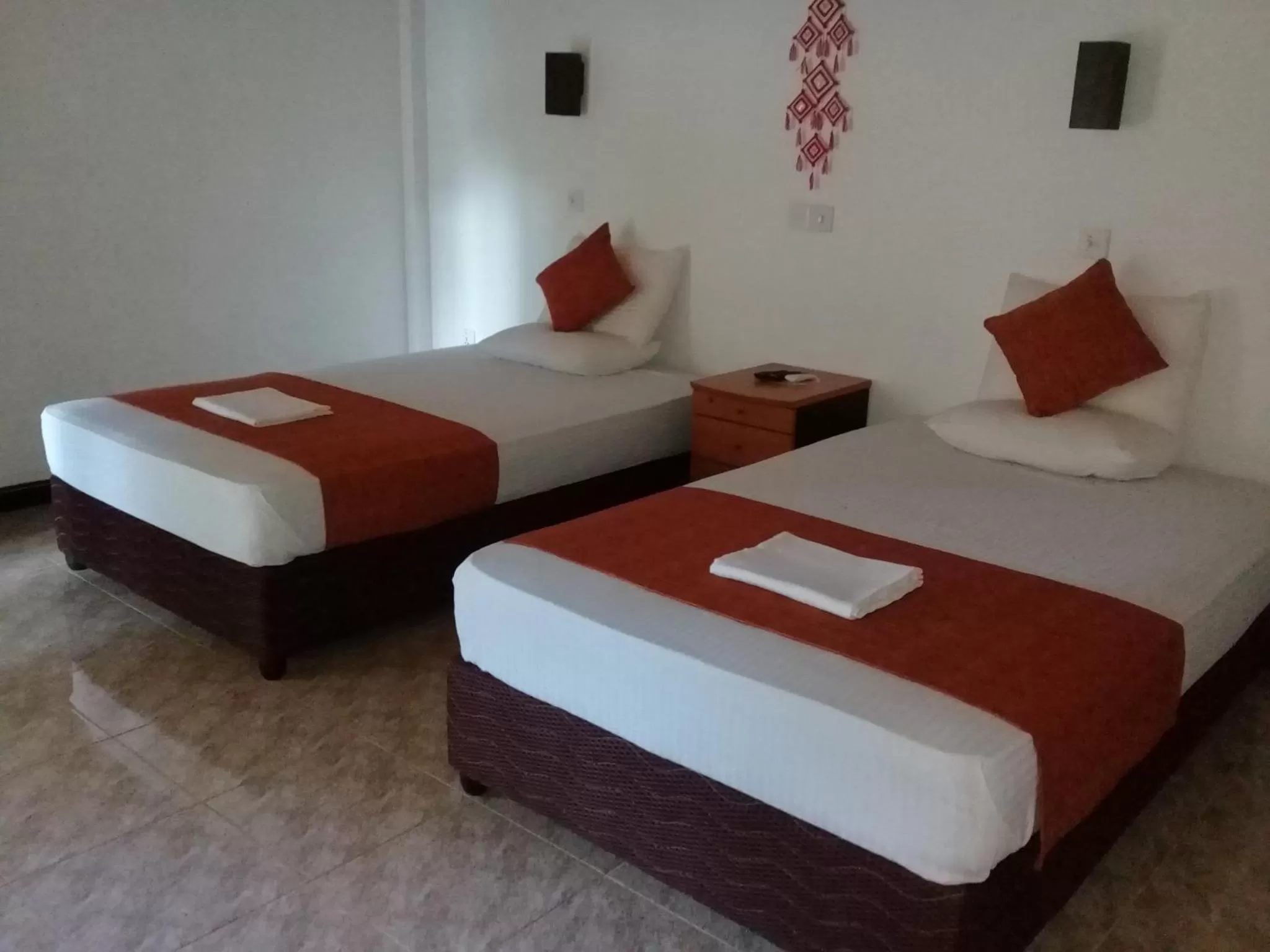 Bed in Kithmi Resort