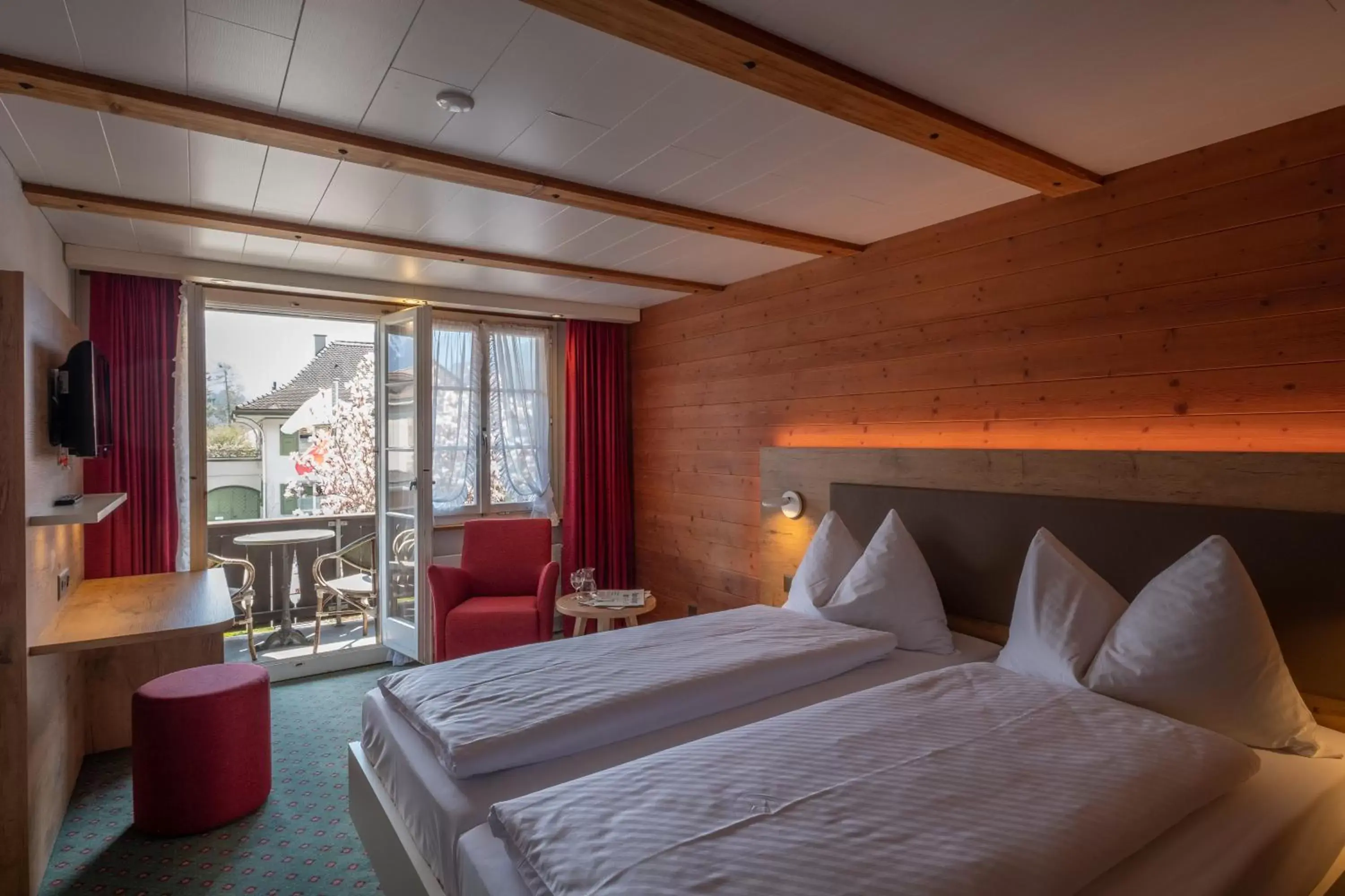 Bed in Hotel Chalet Swiss