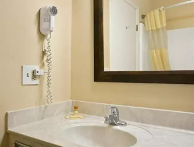 Bathroom in Days Inn by Wyndham Madisonville