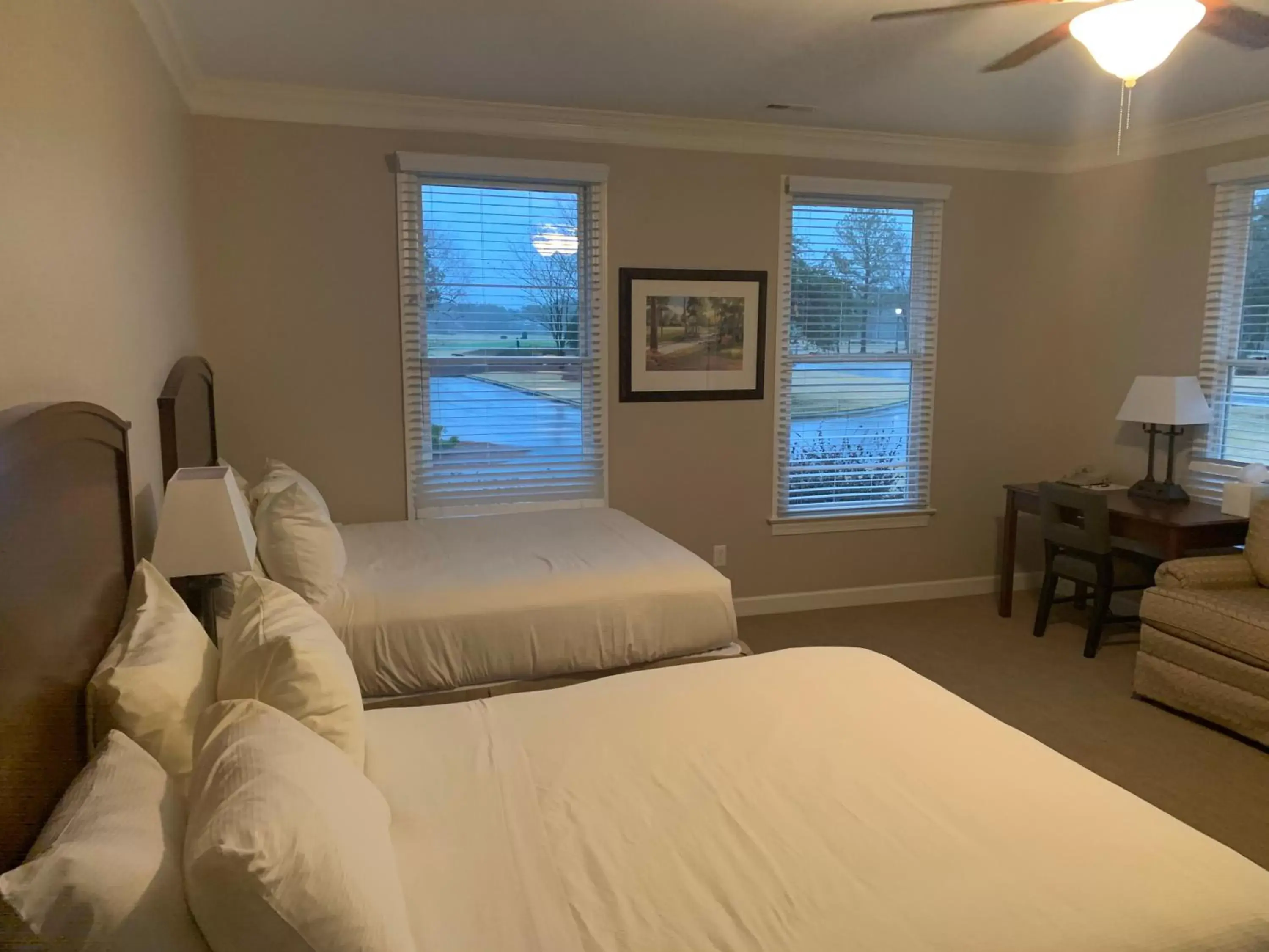 Bed in Cottages and Suites at River Landing