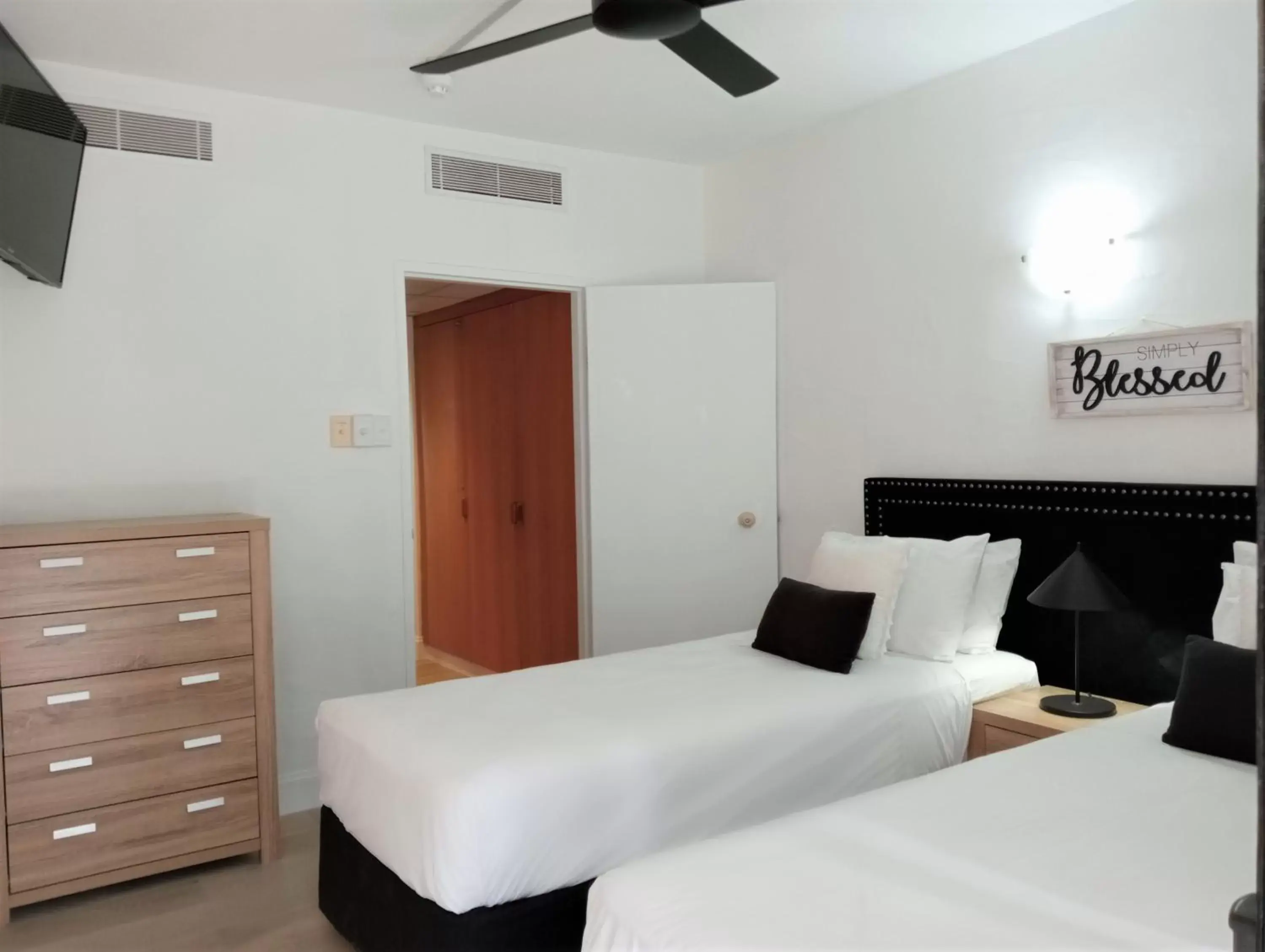 Bed in Club Tropical Resort with Onsite Reception & Check In