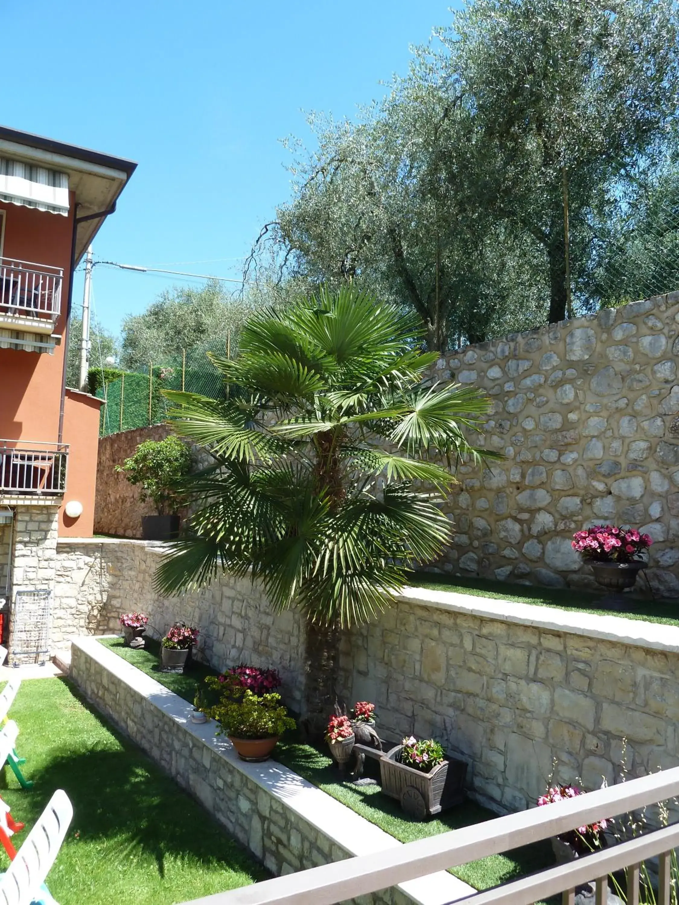 Garden view, Balcony/Terrace in Albergo Casa Este