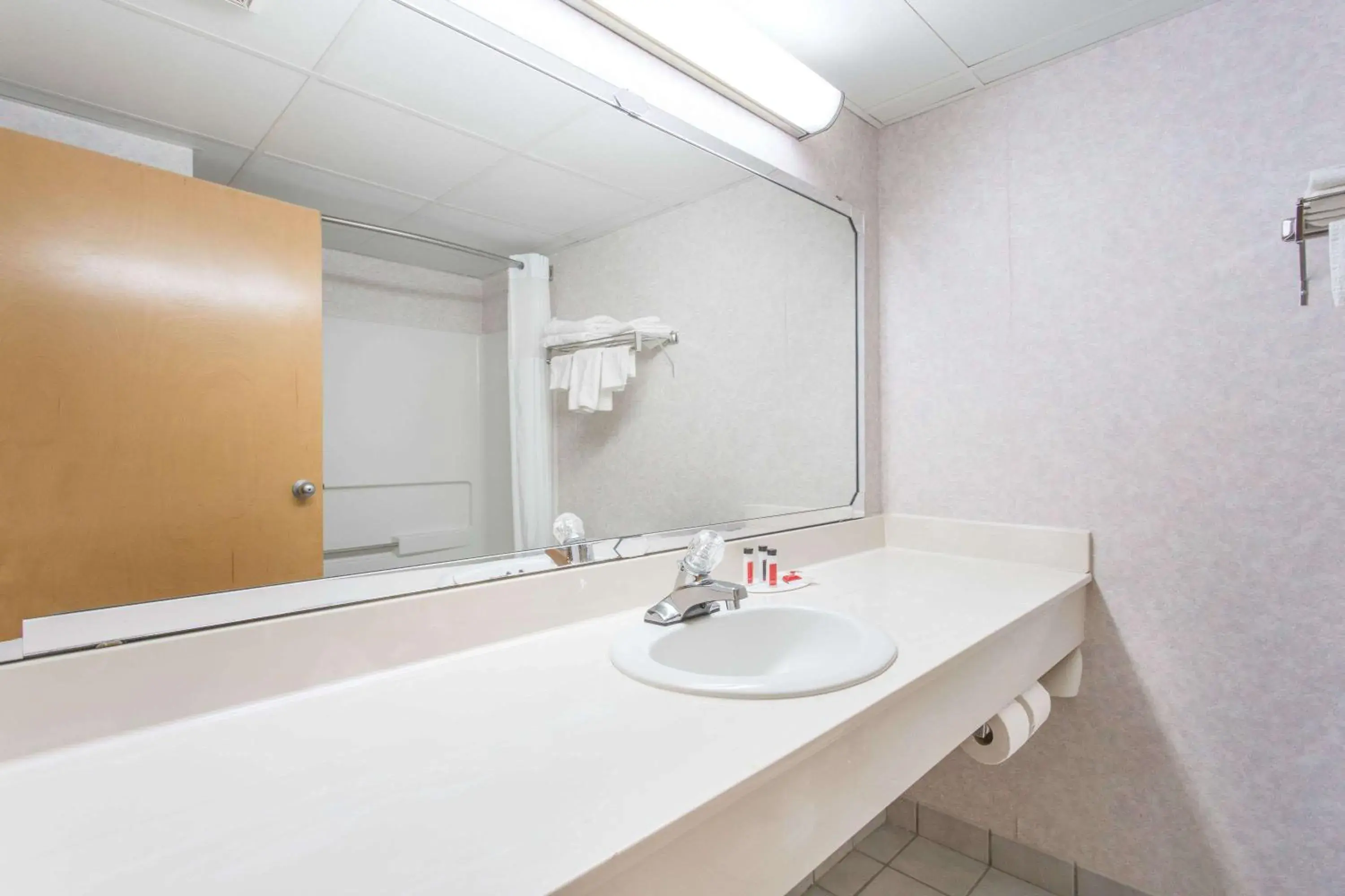 Bathroom in Days Inn by Wyndham High Point/Archdale