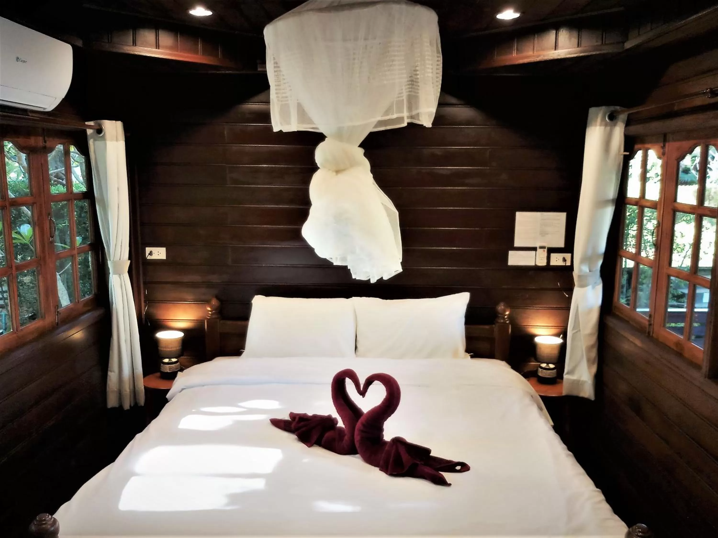 Bed in Cozy Garden Resort