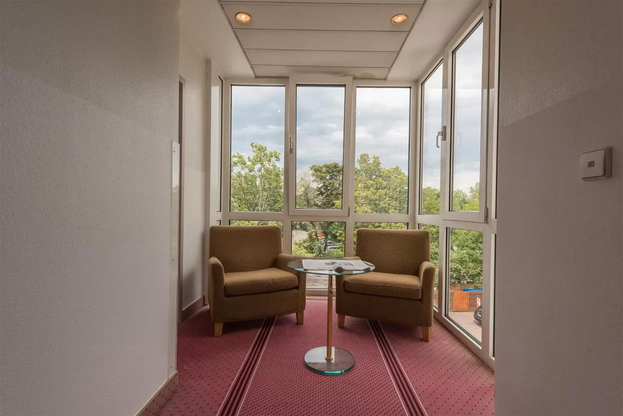 Property building, Seating Area in Parkhotel Frankfurt Airport