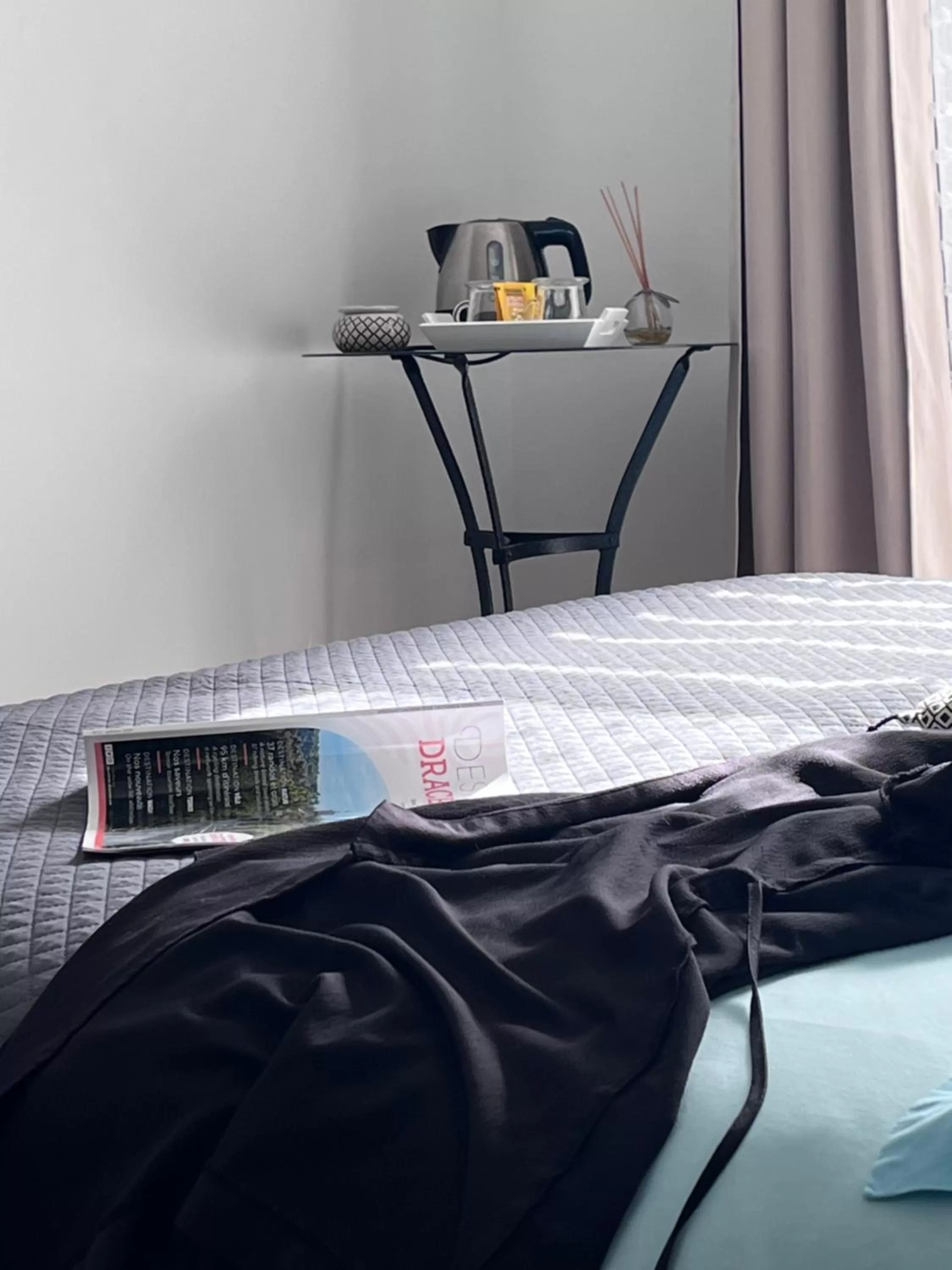 Bed in CARPE DIEM Résidence Hôtelière