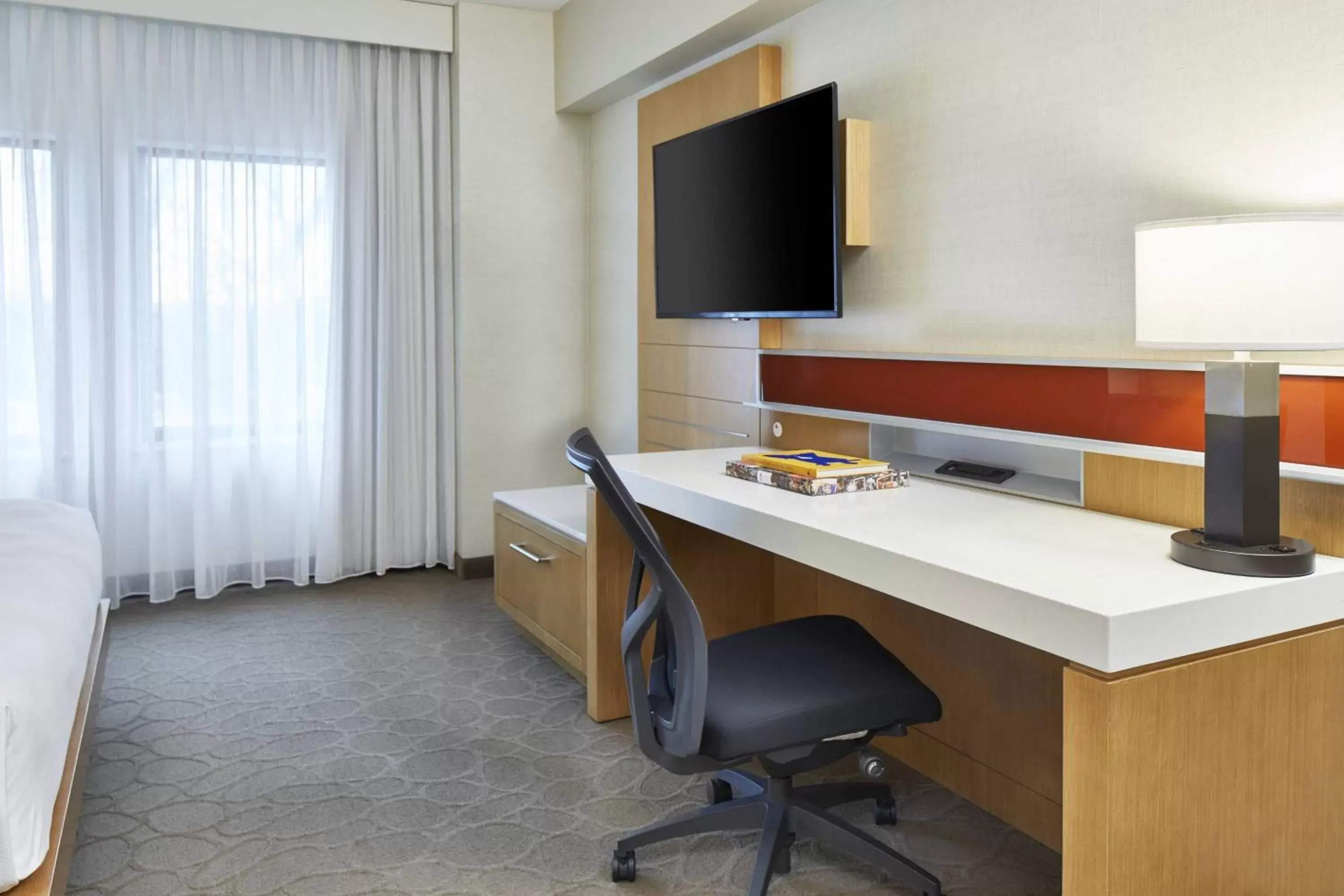 Photo of the whole room, TV/Entertainment Center in Renaissance Chicago Glenview Suites Hotel