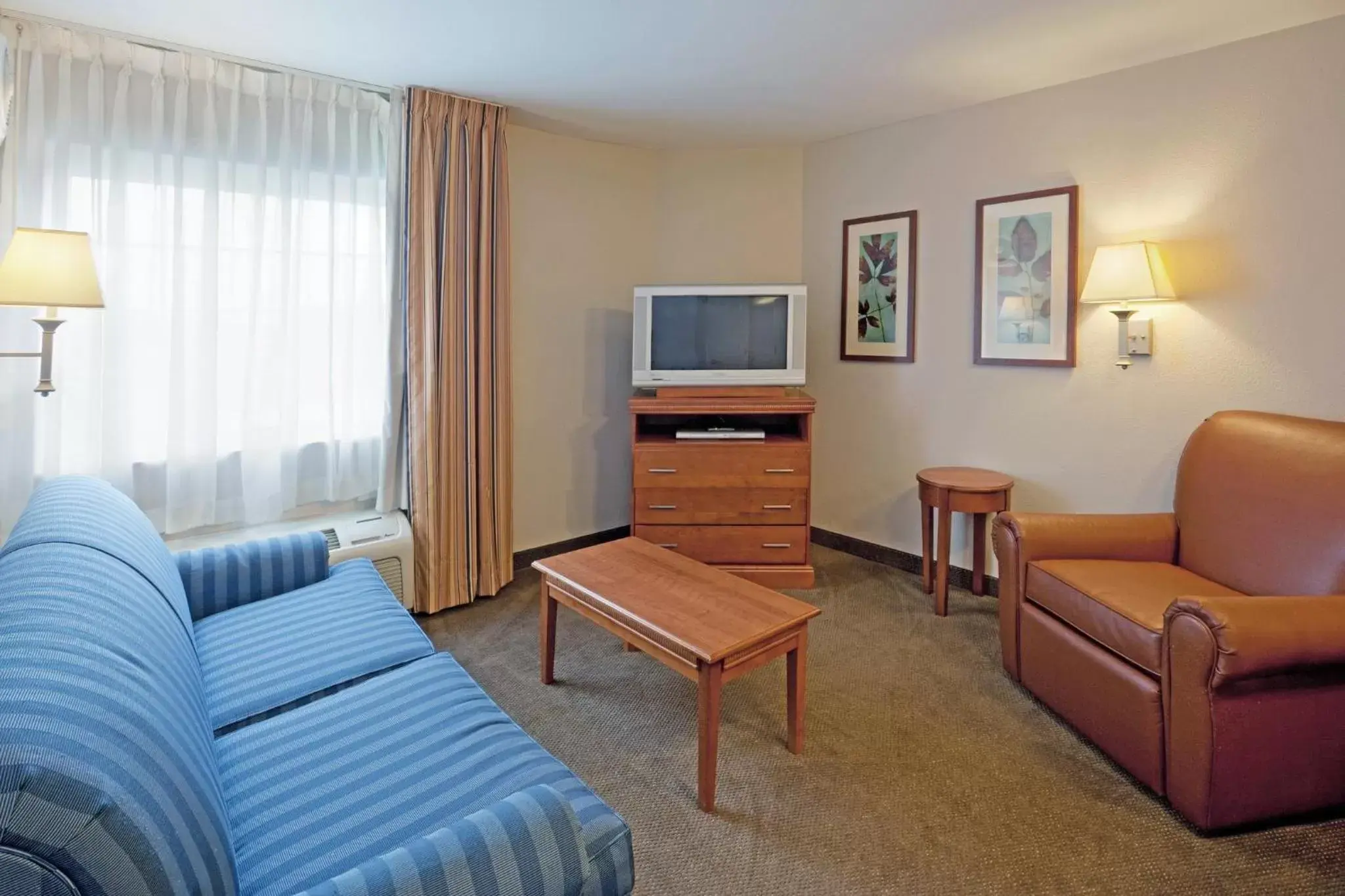 Photo of the whole room, Seating Area in Candlewood Suites-West Springfield, an IHG Hotel