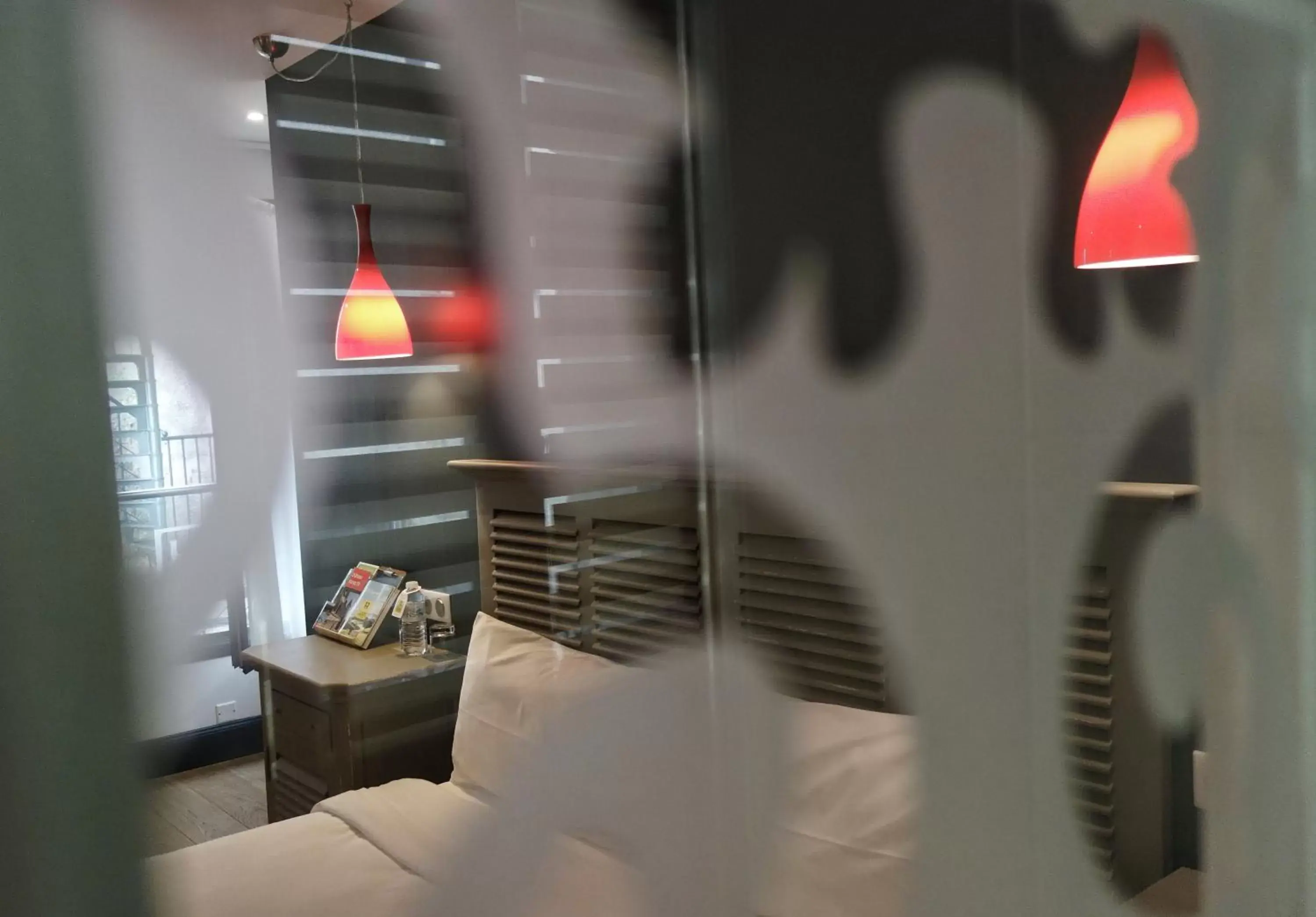 Decorative detail, Bed in Hôtel Henri IV Decorative detail, Bed in Hôtel Henri IV