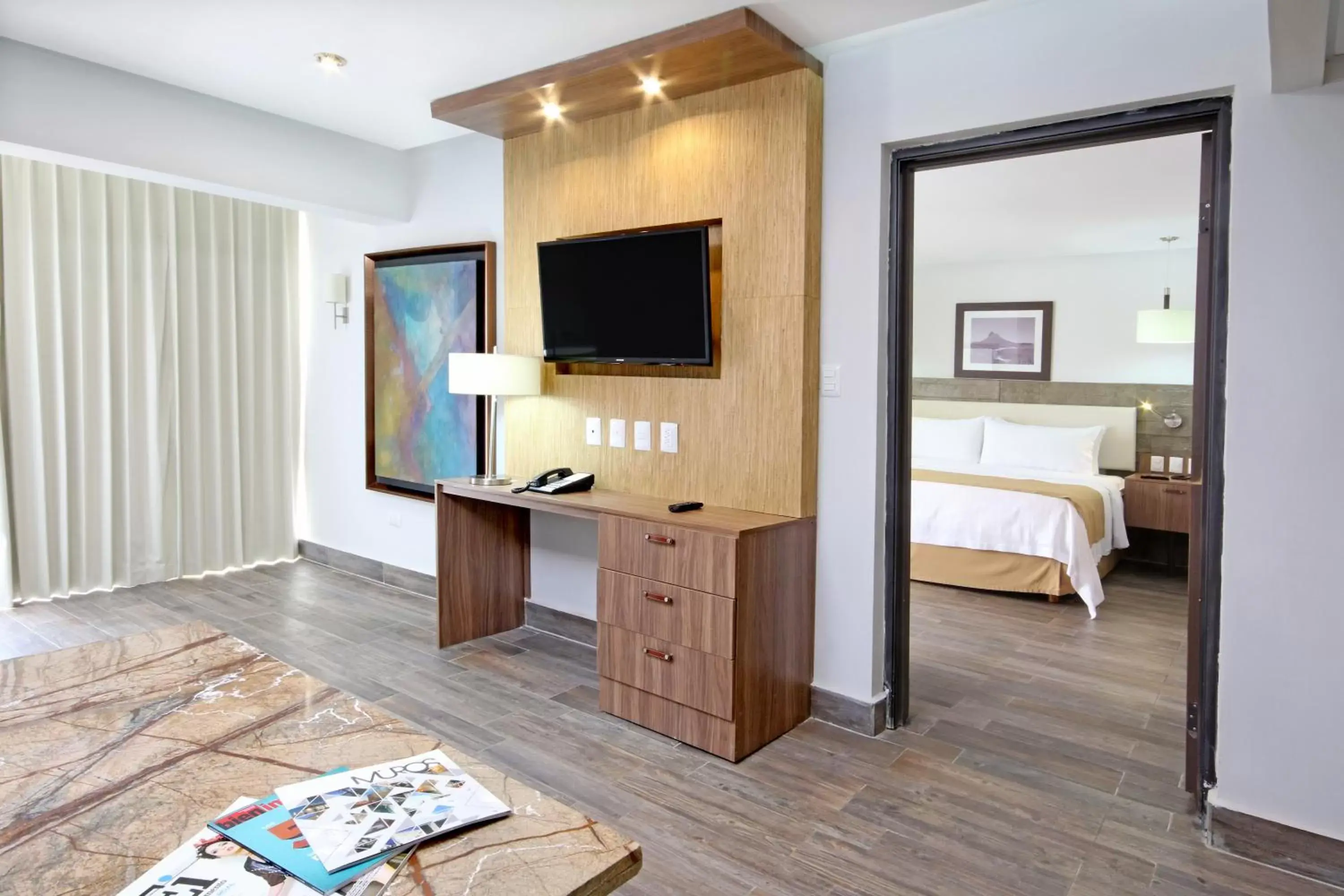 Bedroom, TV/Entertainment Center in Holiday Inn Hermosillo, an IHG Hotel