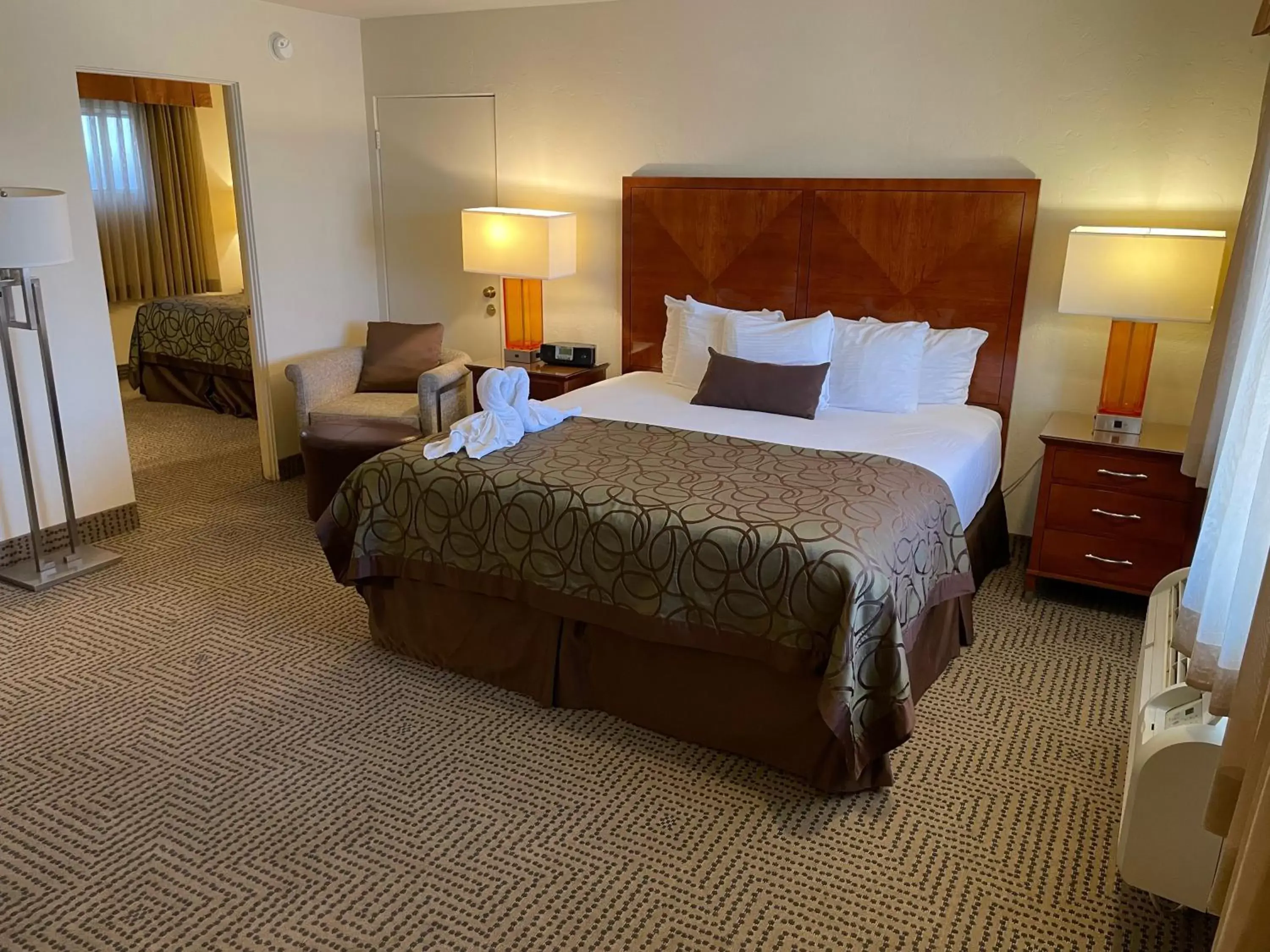 Bed in Coronado Motor Hotel, a Travelodge by Wyndham