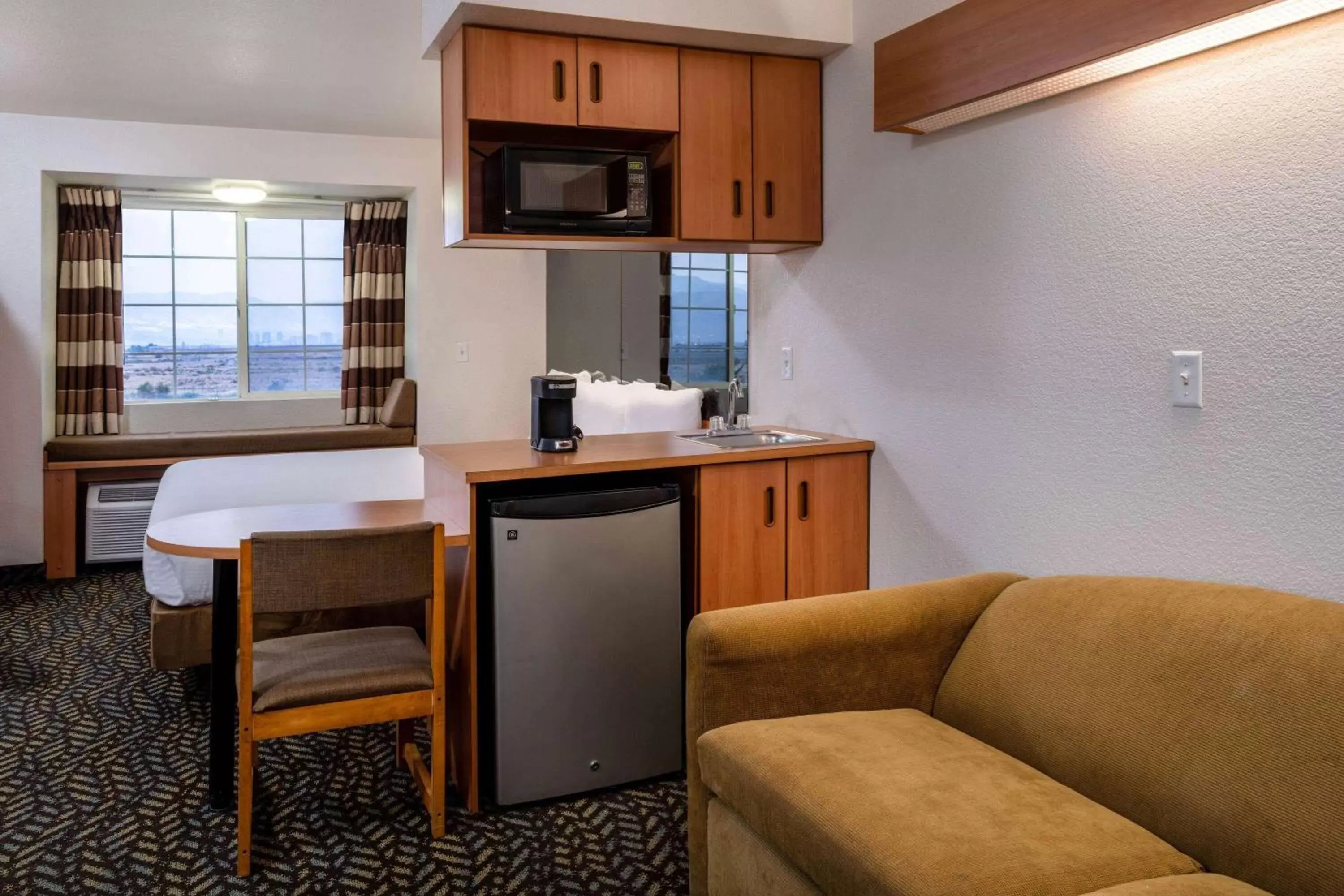 Photo of the whole room, Kitchen/Kitchenette in Microtel Inn & Suites by Wyndham Salt Lake City Airport