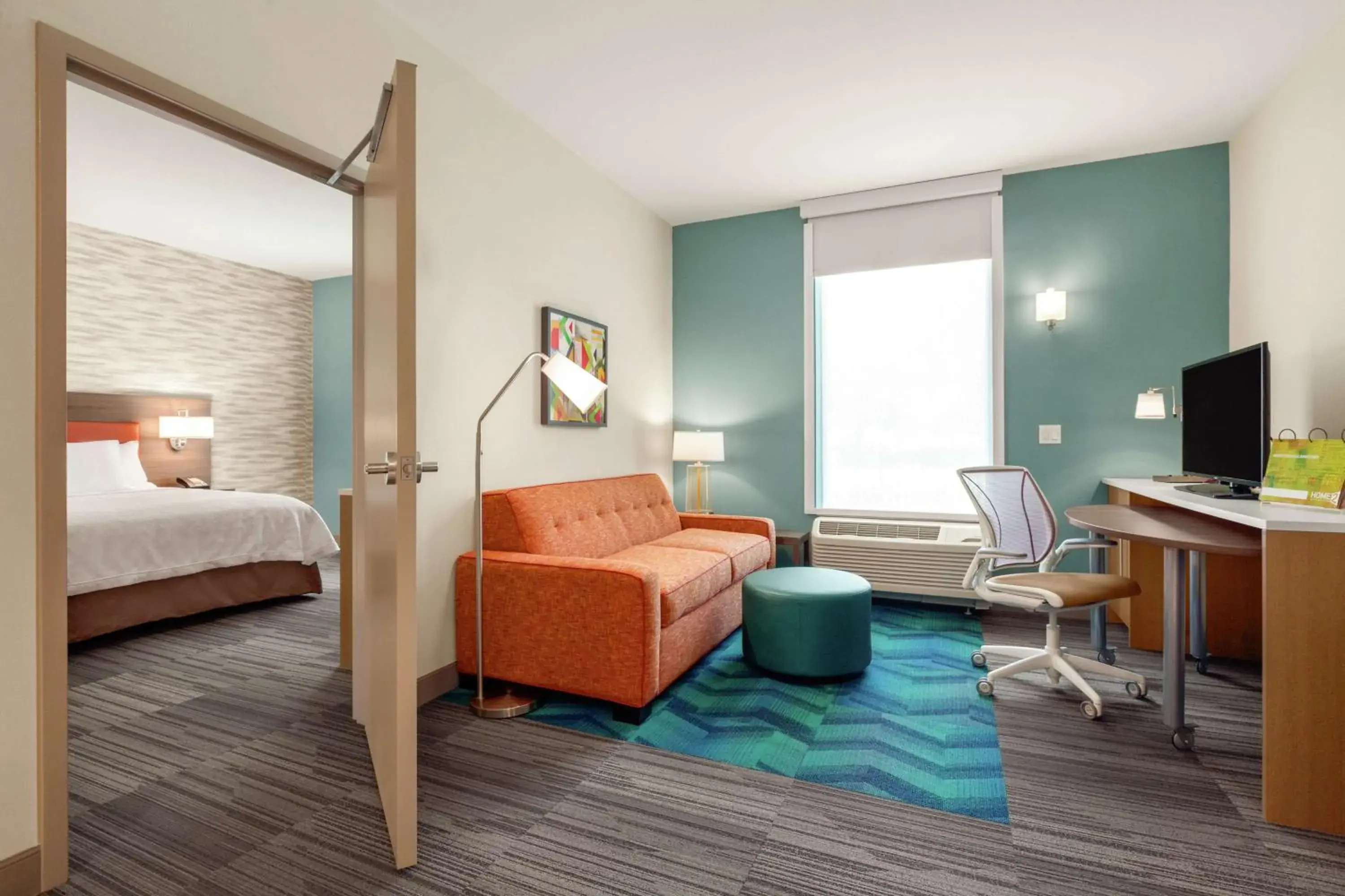 Bedroom, TV/Entertainment Center in Home2 Suites by Hilton Sarasota - Bradenton Airport, FL