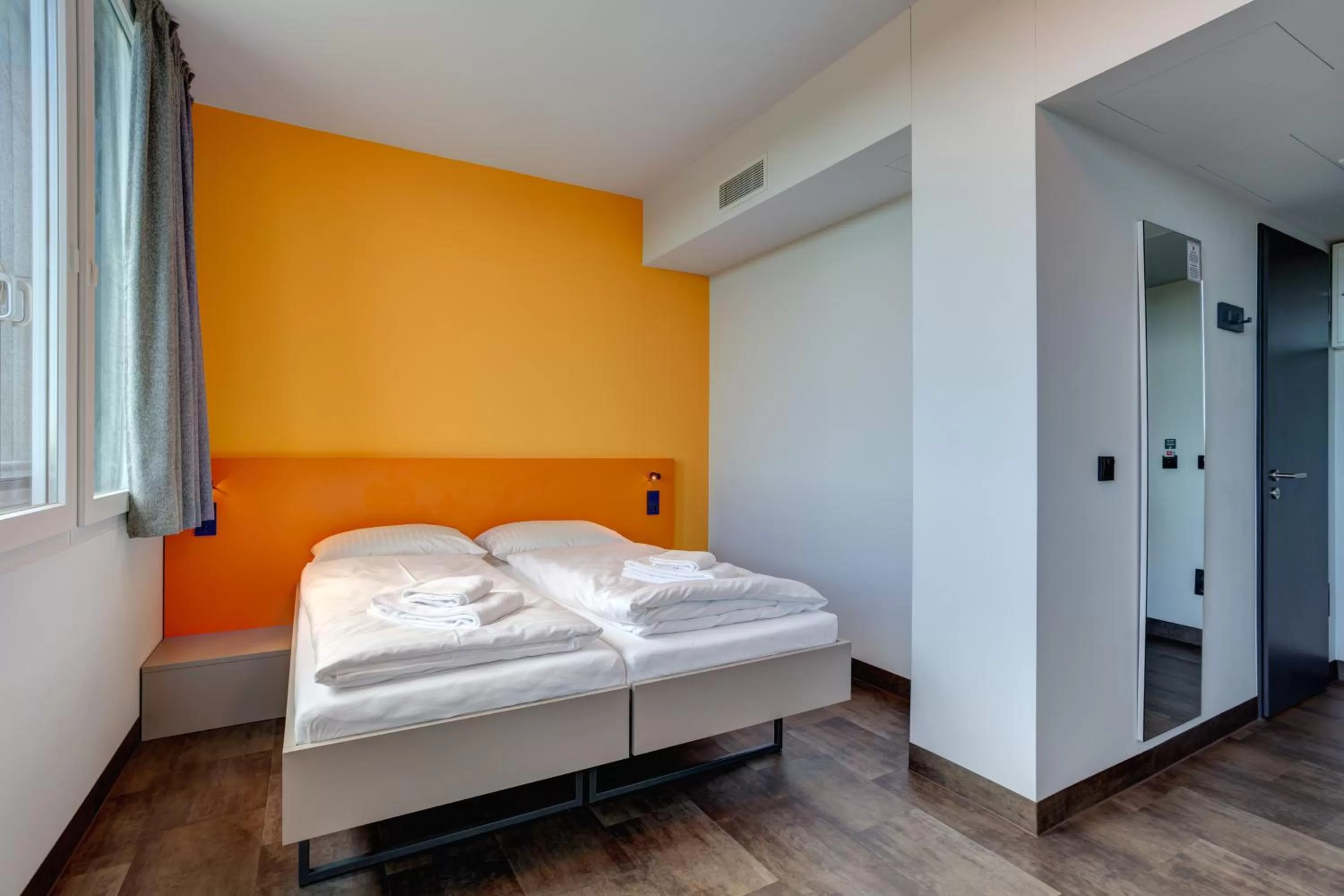 Photo of the whole room, Bed in MEININGER Hotel München Olympiapark