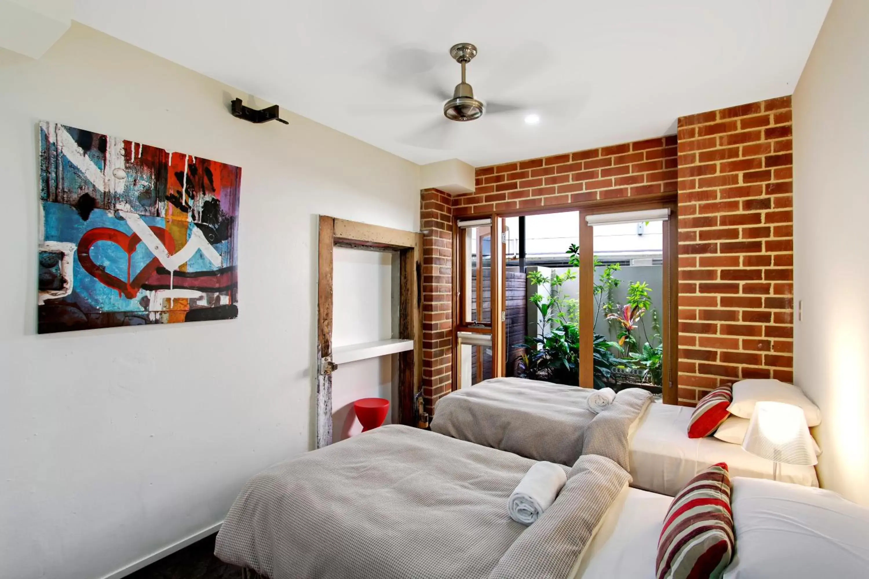 Bedroom in Byron Butter Factory Apartments