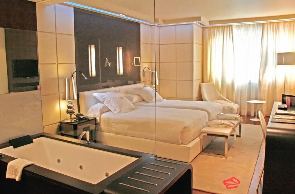 Bed in Gran Hotel Nagari Boutique & Spa