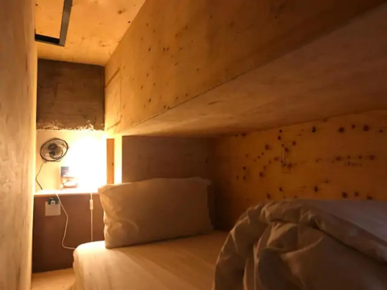 Bed in Mini West Hotel