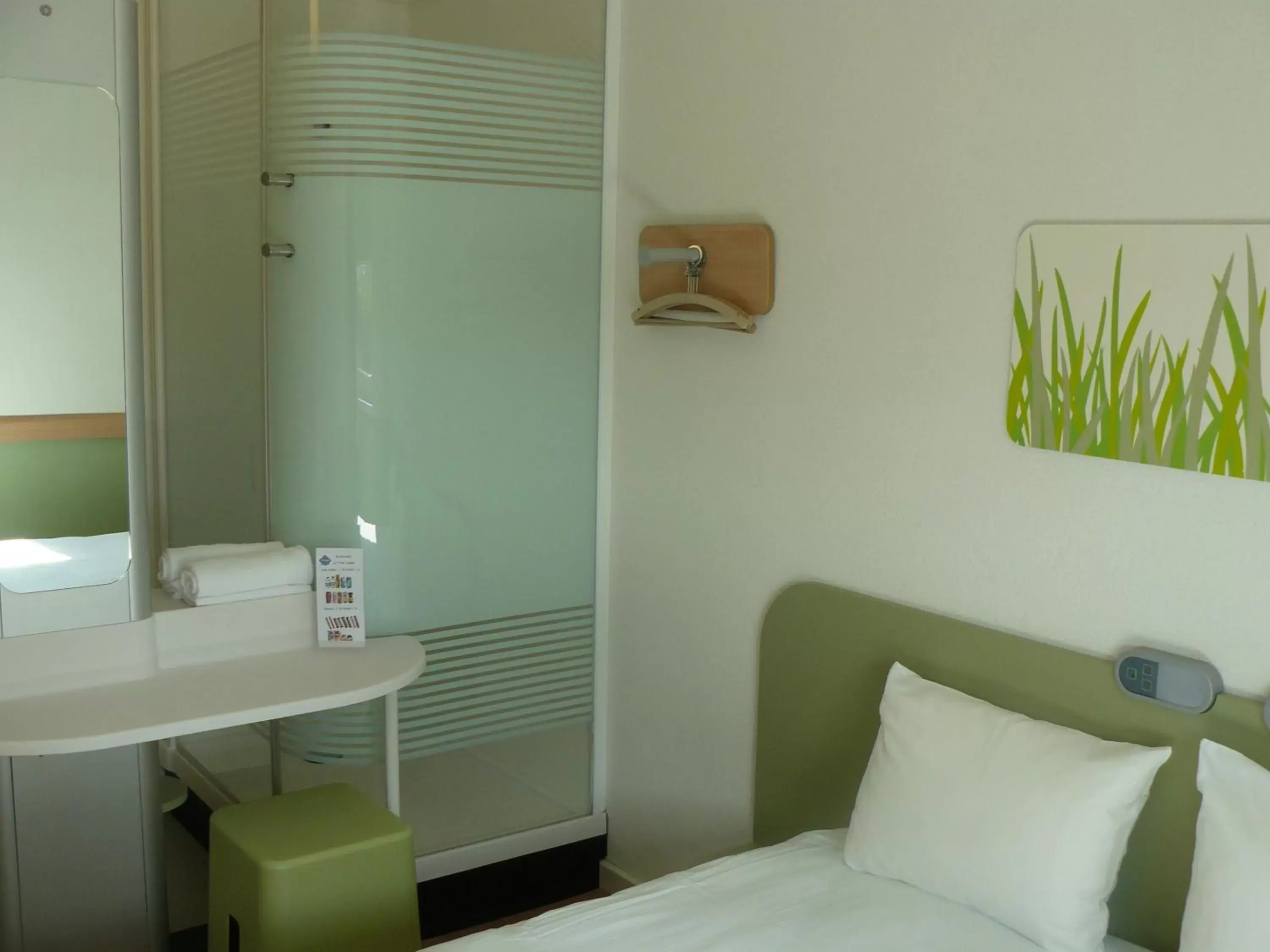 Bed, Bathroom in ibis Budget Luxembourg Sud