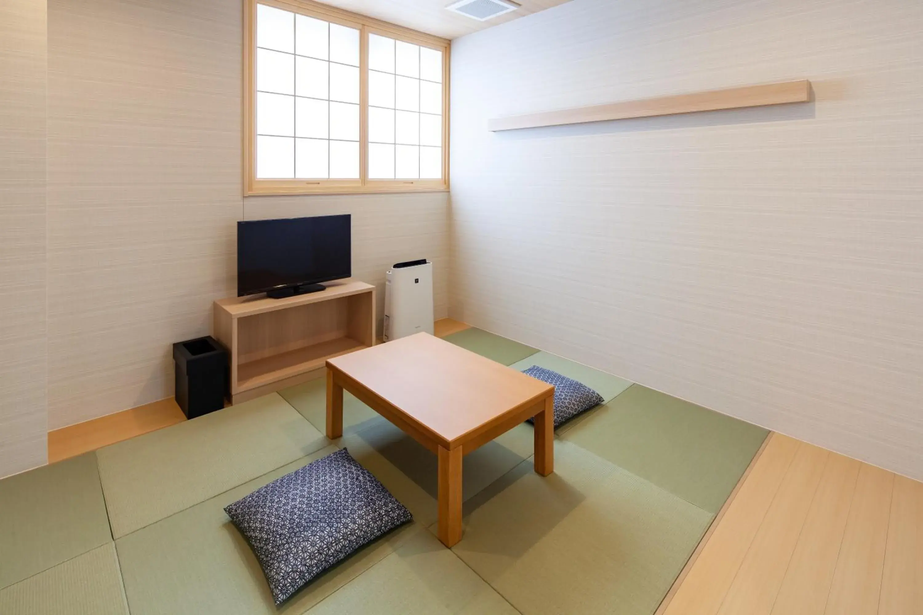 Photo of the whole room, TV/Entertainment Center in Y's CABIN&HOTEL Naha Kokusai Street